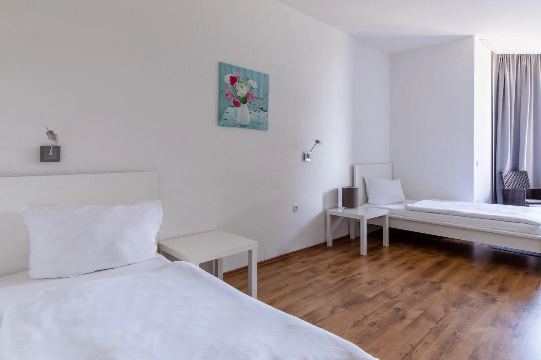 Bed in Hotel Garni Zum Dorfbrunnen