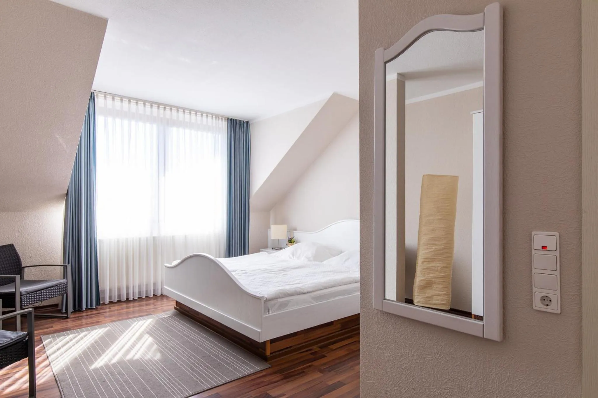 Bed in Hotel Garni Zum Dorfbrunnen