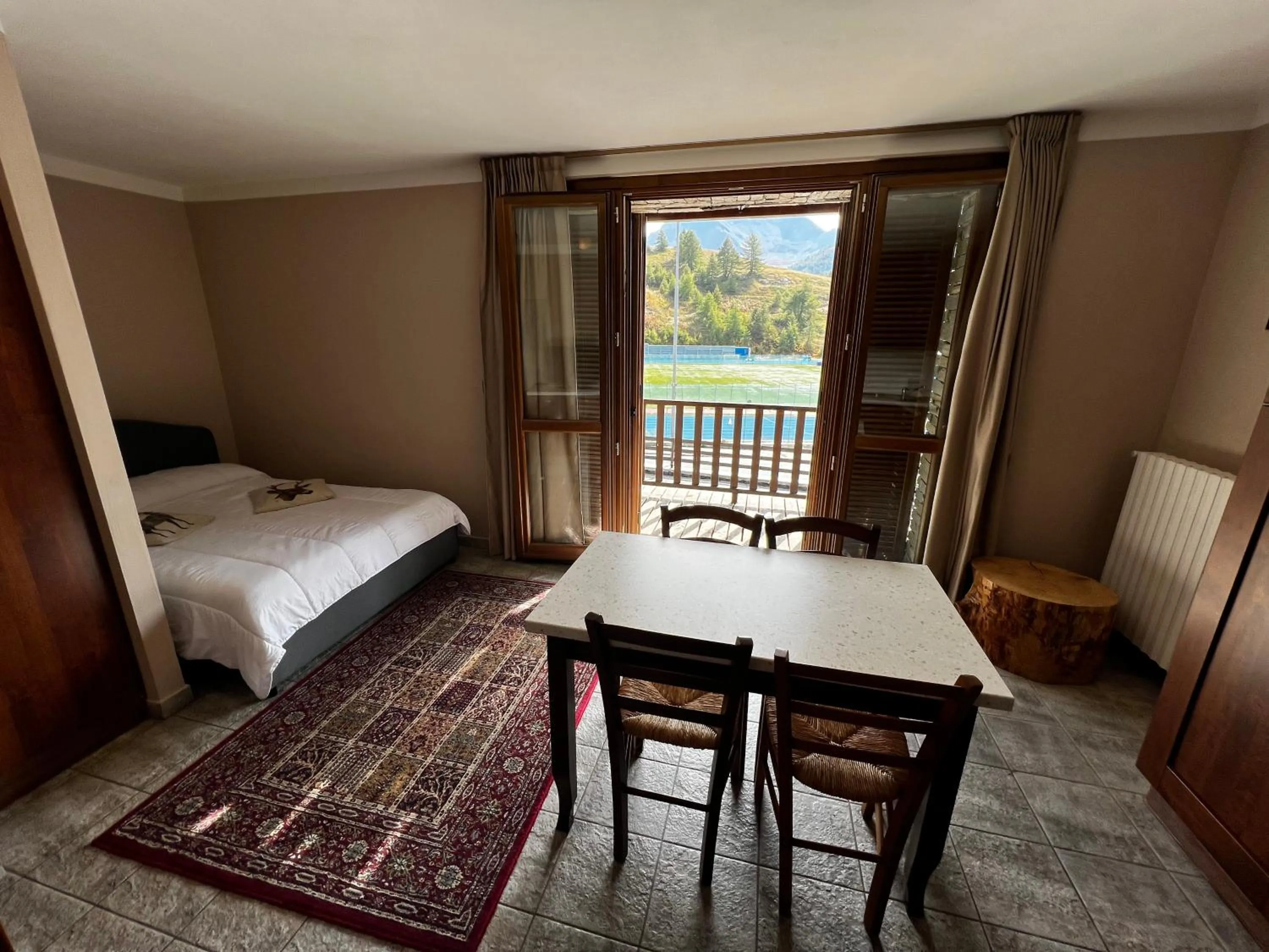 Bed in Chalet Edelweiss - Estella Hotel Collection