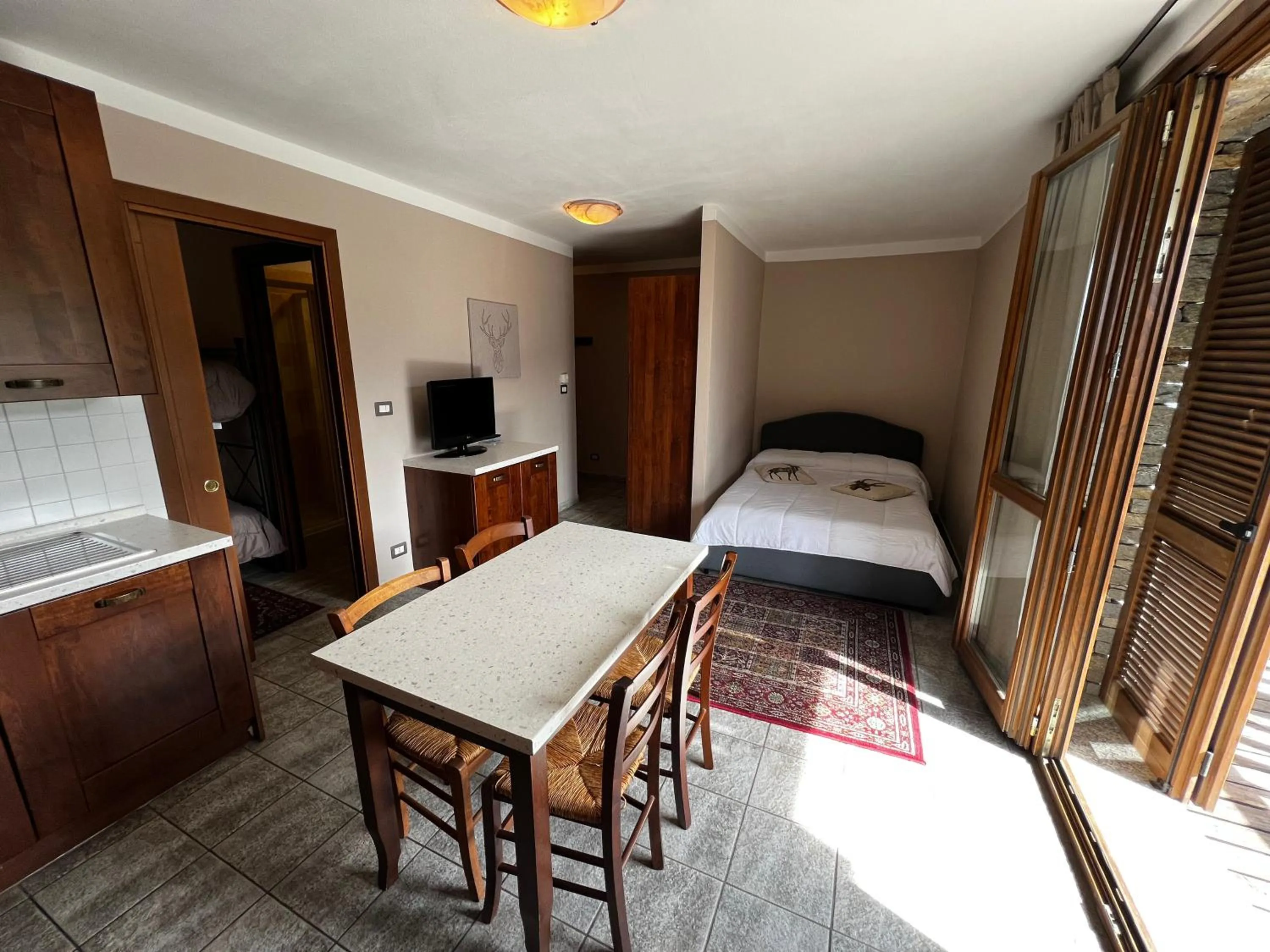 Bed in Chalet Edelweiss - Estella Hotel Collection