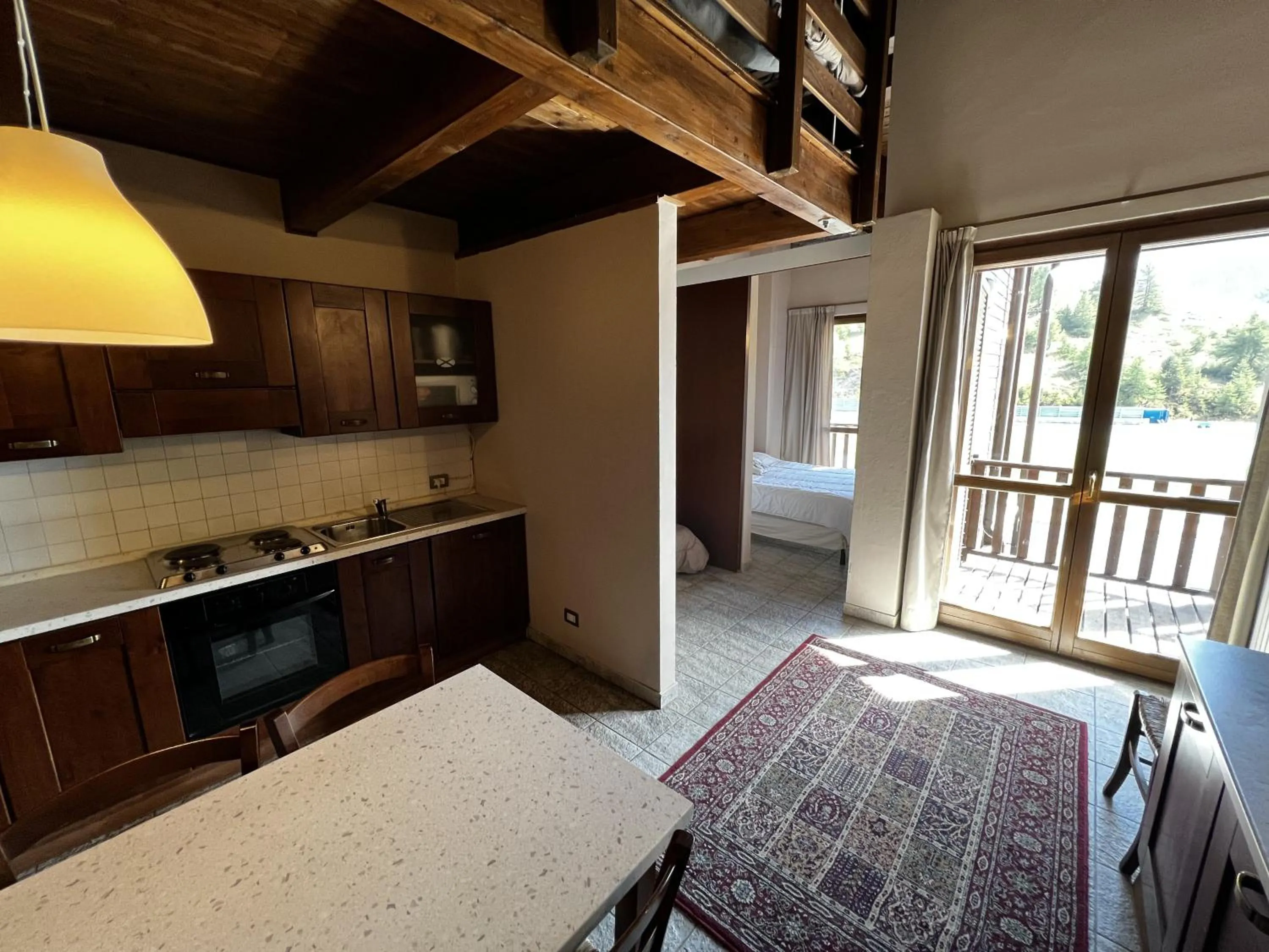 Kitchen or kitchenette, Bed in Chalet Edelweiss - Estella Hotel Collection