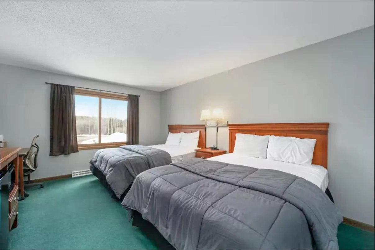 Bed in Snow Chasers Lodge