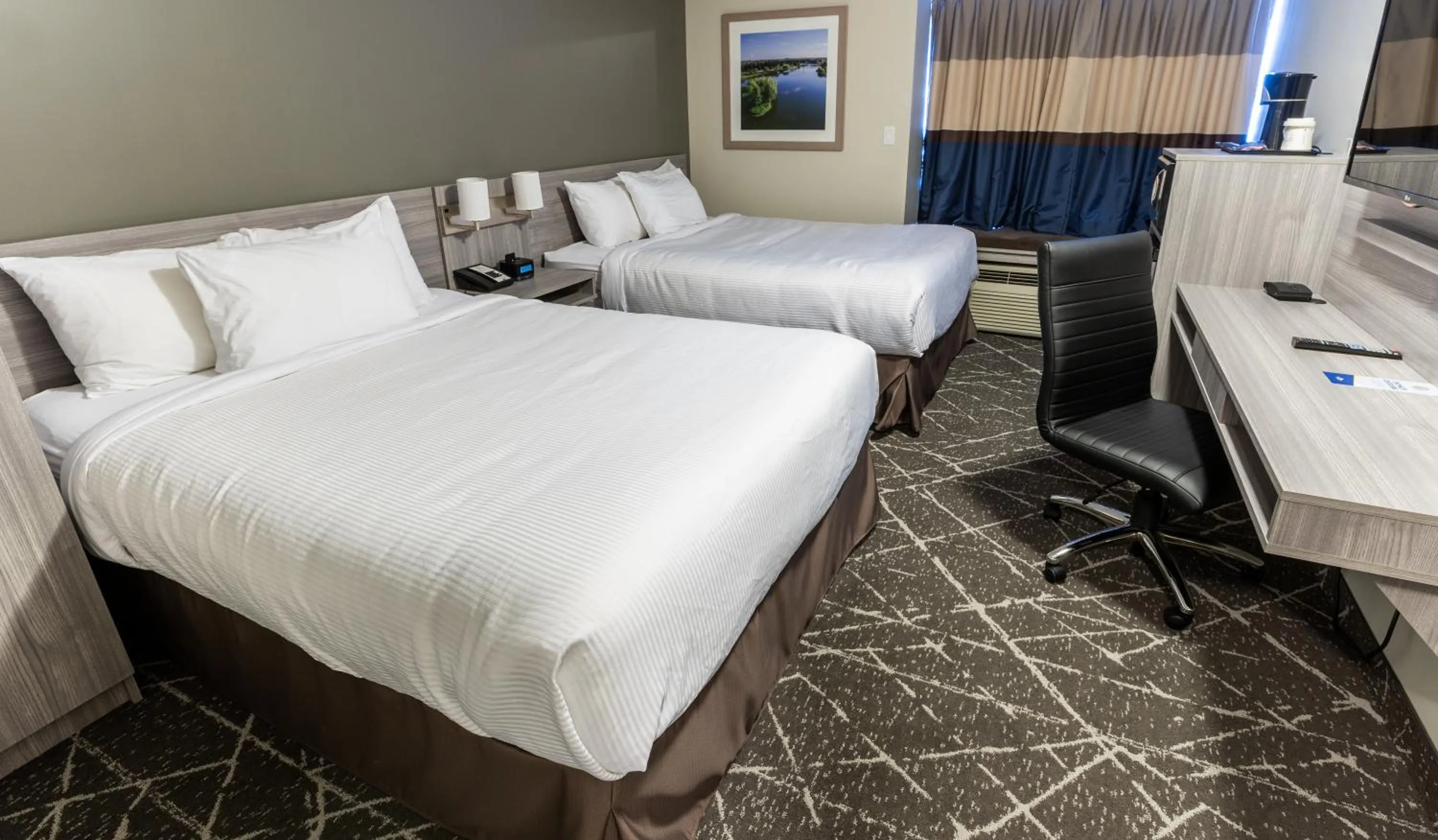 Bed in Microtel Inn & Suites by Wyndham Lloydminster