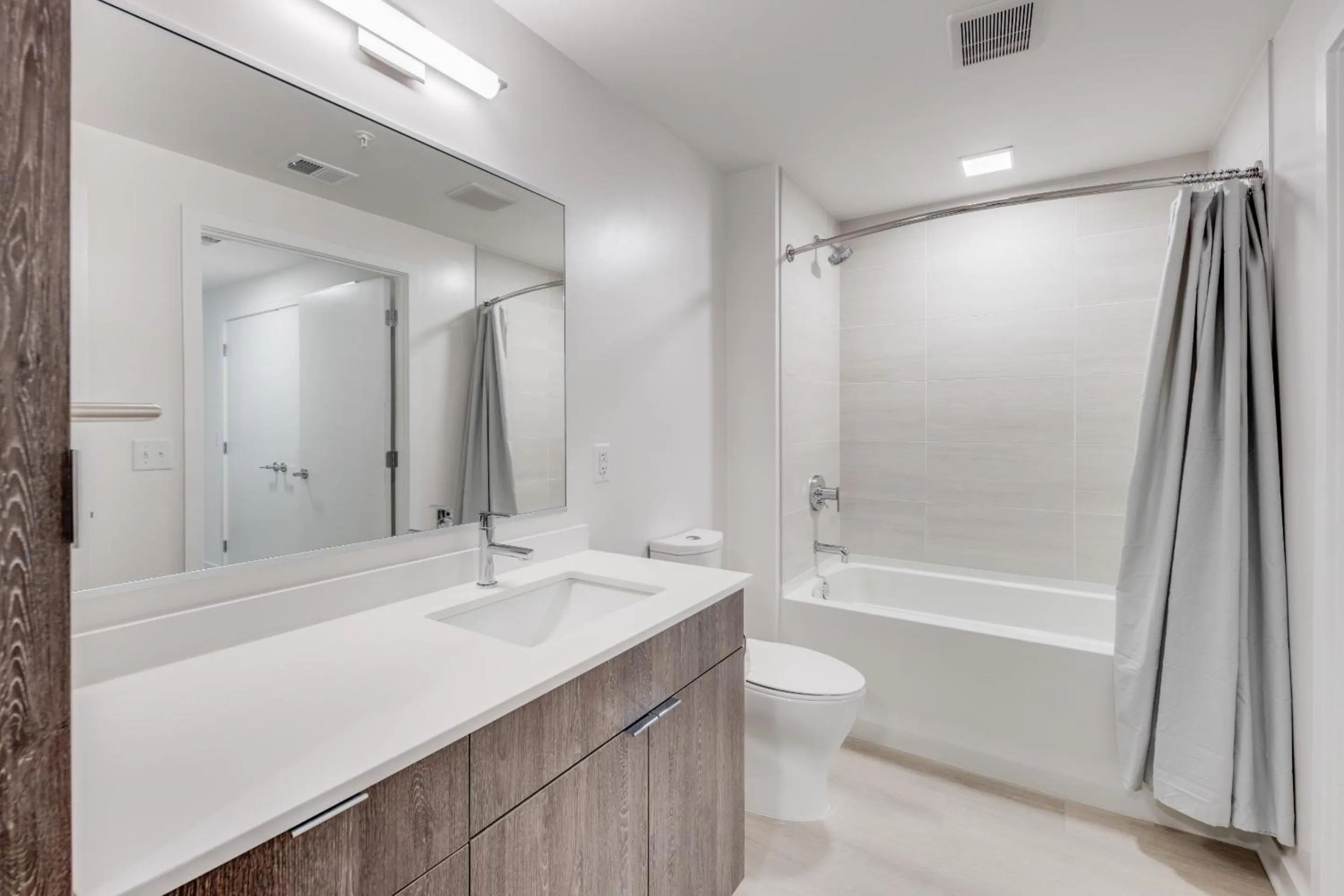 Shower in Global Luxury Suites at Capitol Hill