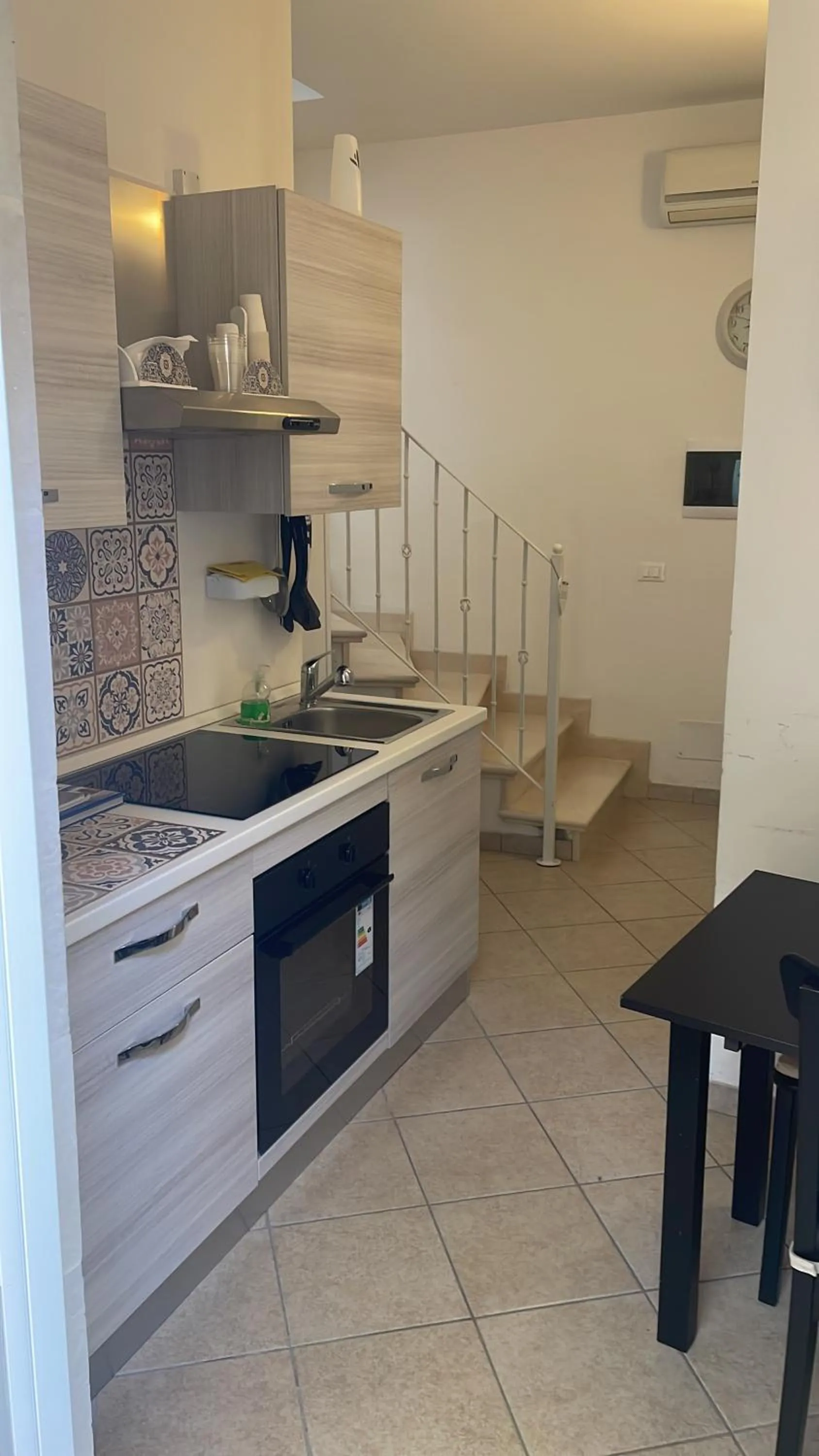 Kitchen or kitchenette in Book and Bed