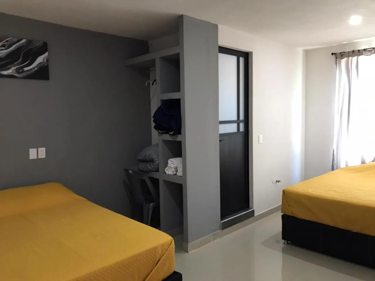 Bed in HOTEL NUEVA LUNA