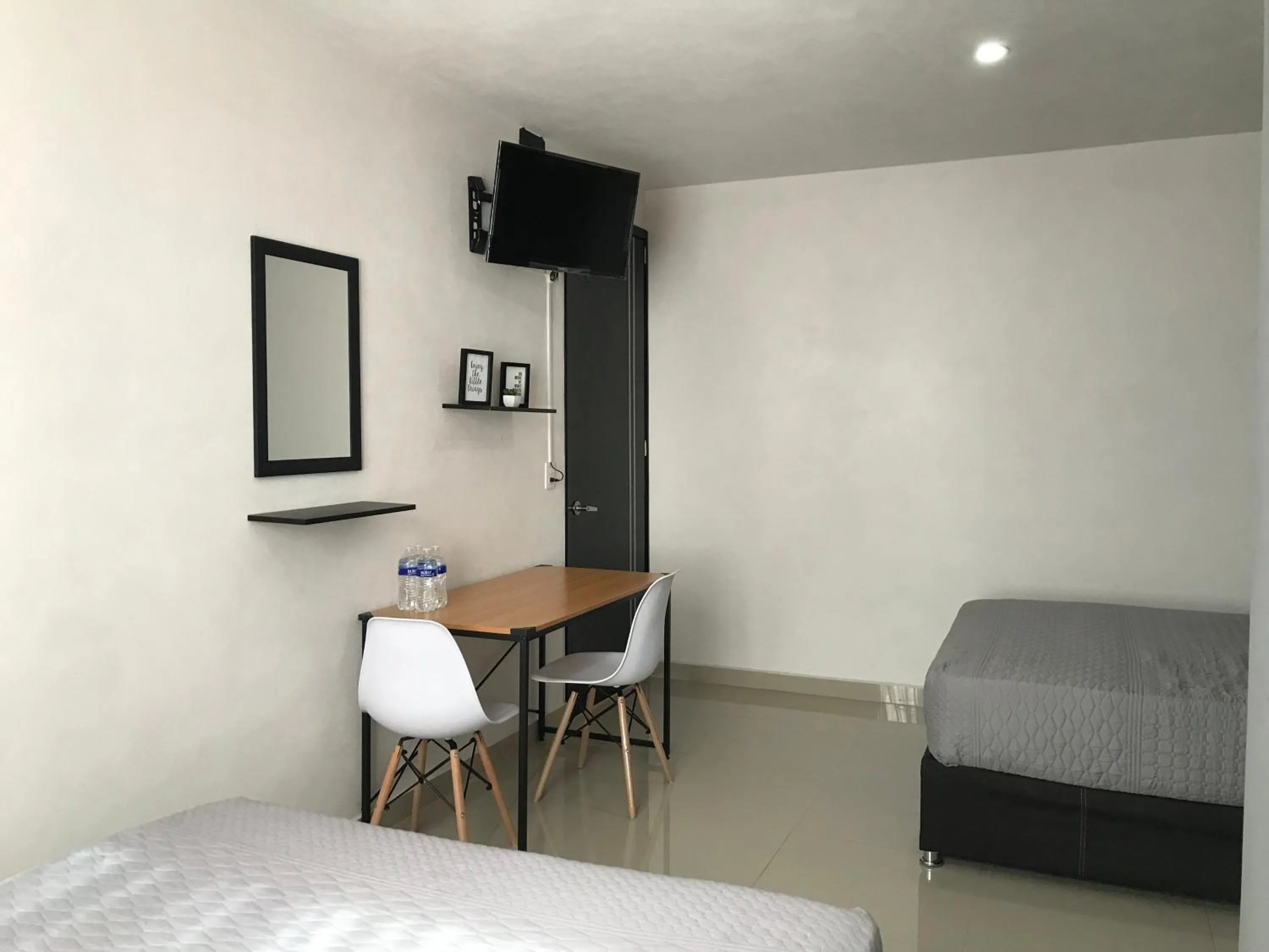 Bed in HOTEL NUEVA LUNA