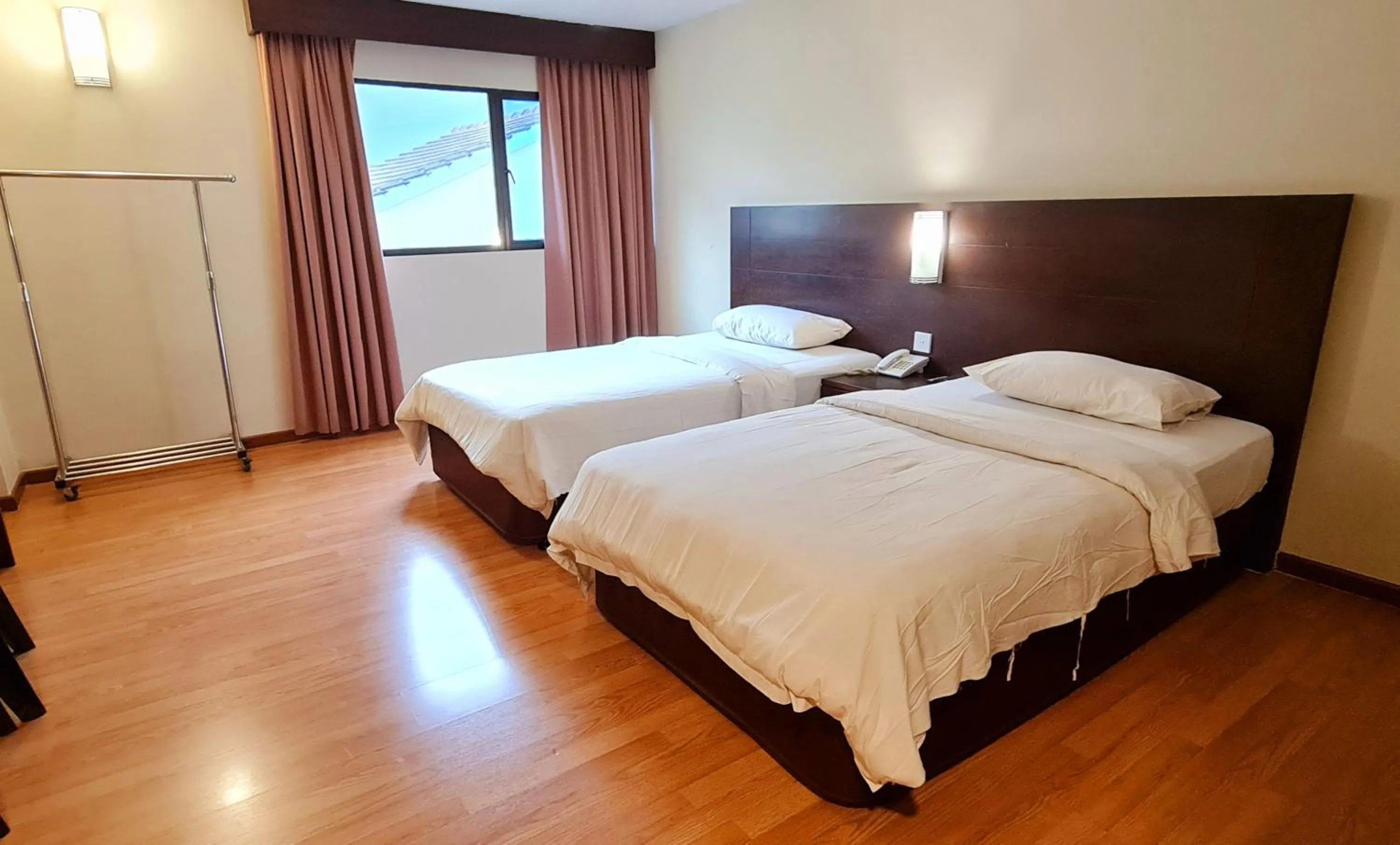 Bed in PP Hotel by Moxy