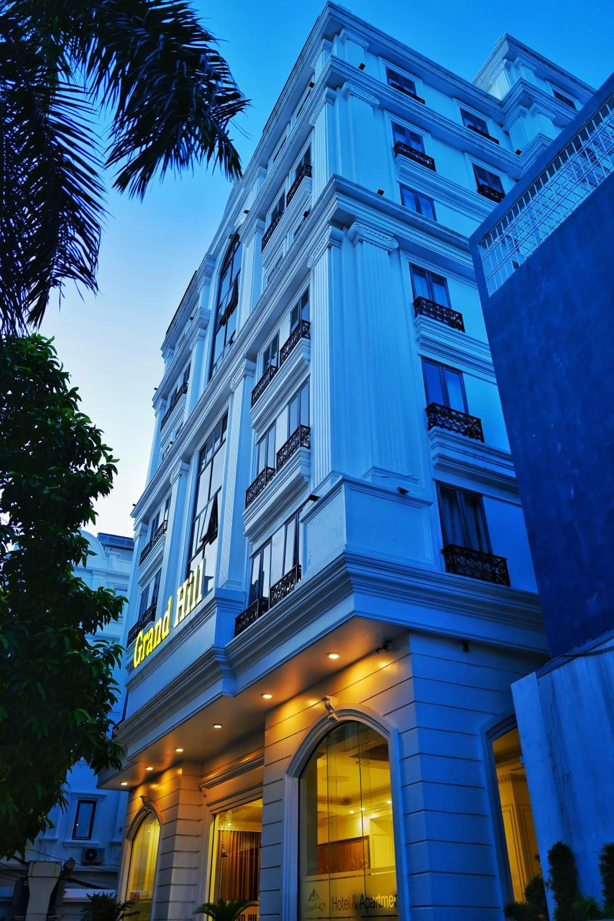 Property building in Grand Hill Hotel & Apartment