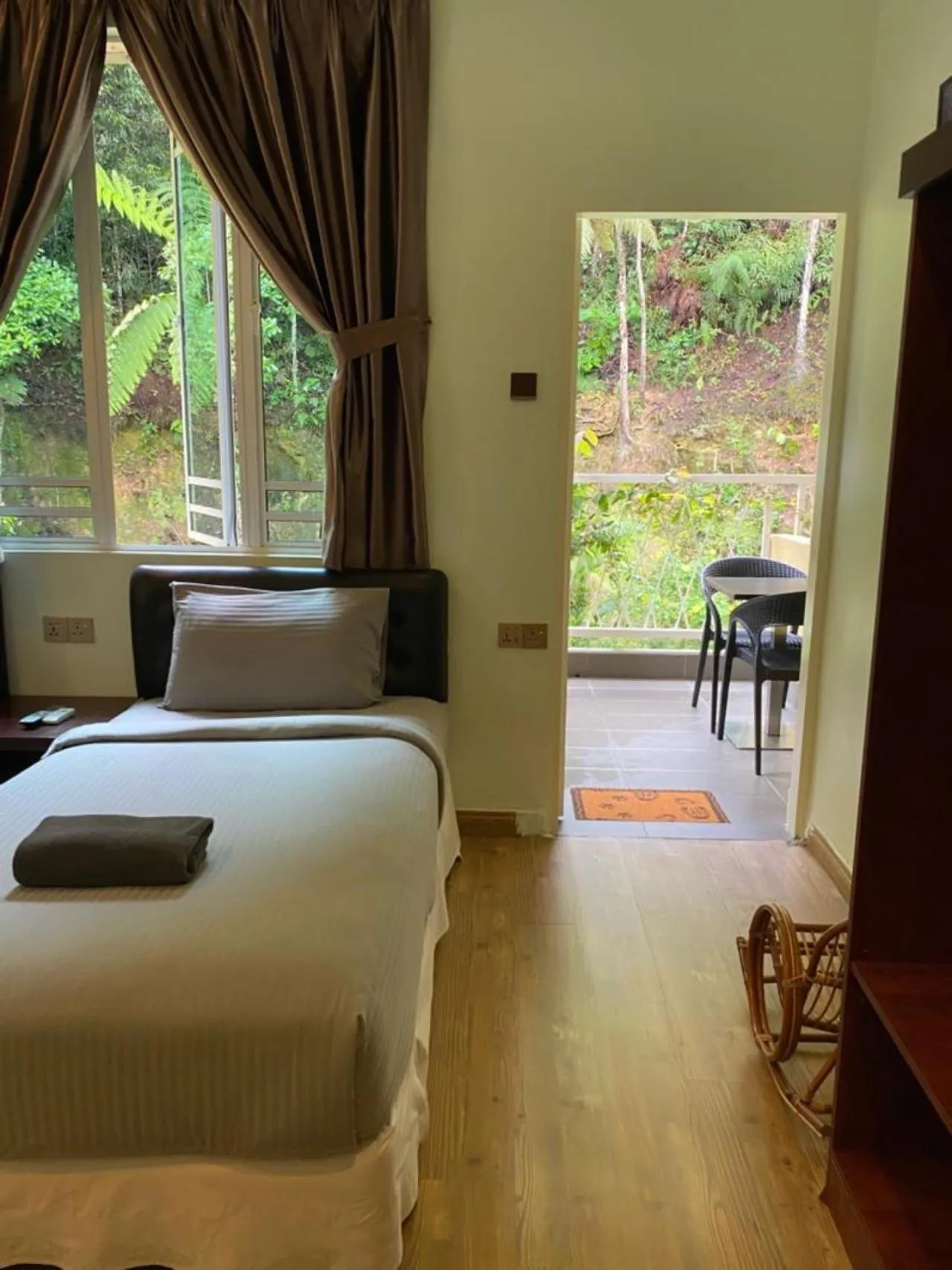 Bed in Highlanders Garden Guesthouse at Arundina Cameron Highlands