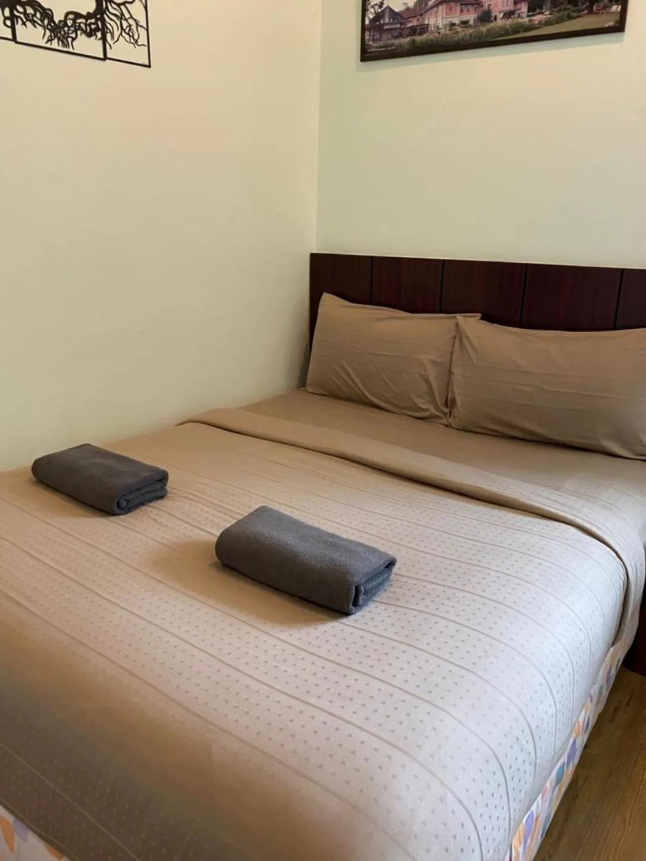 Bed in Highlanders Garden Guesthouse at Arundina Cameron Highlands