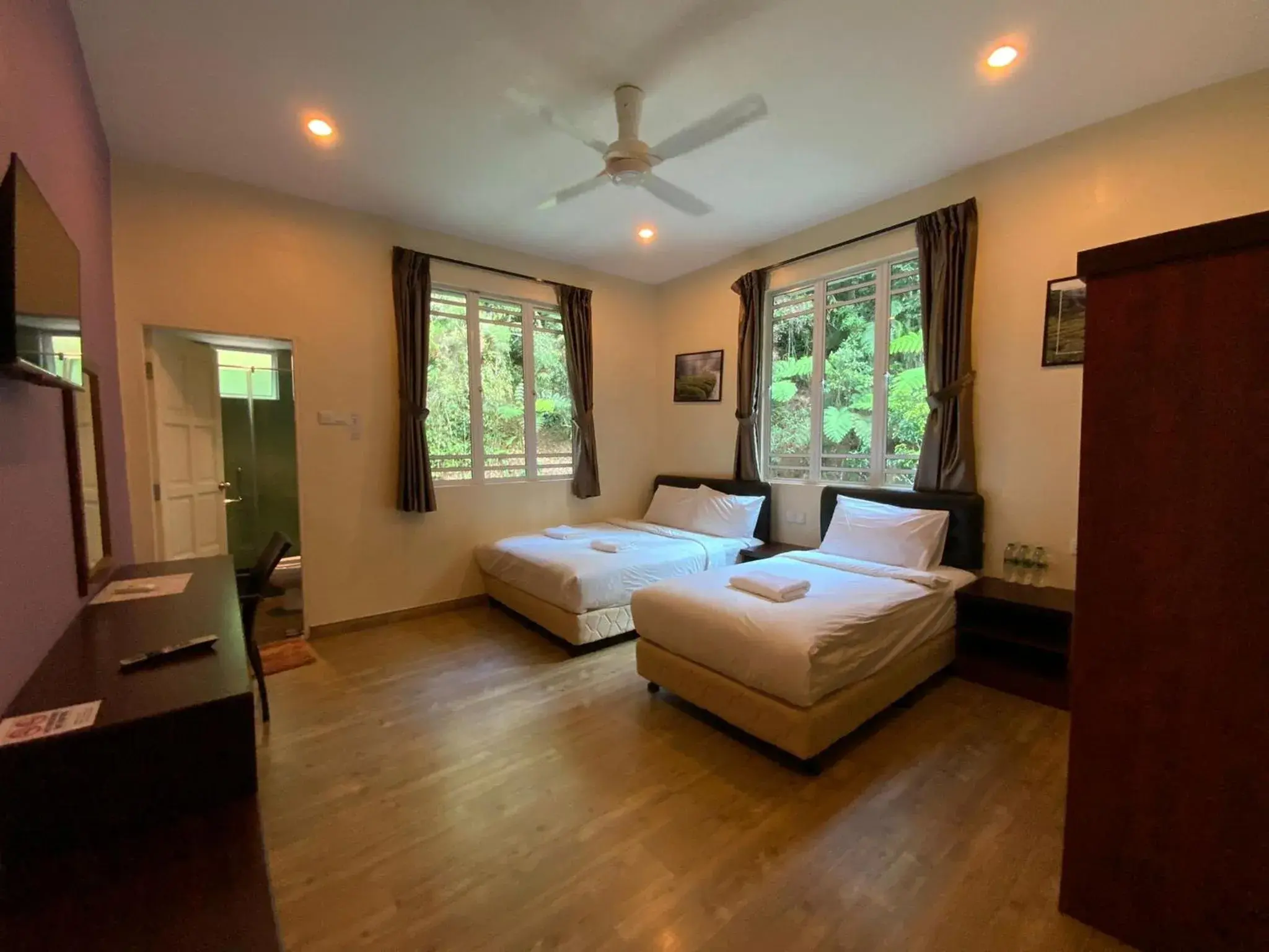 Photo of the whole room, Bed in Highlanders Garden Guesthouse at Arundina Cameron Highlands Photo of the whole room, Bed in Highlanders Garden Guesthouse at Arundina Cameron Highlands