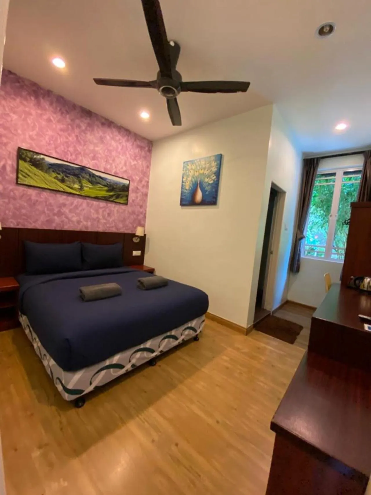 Bed in Highlanders Garden Guesthouse at Arundina Cameron Highlands