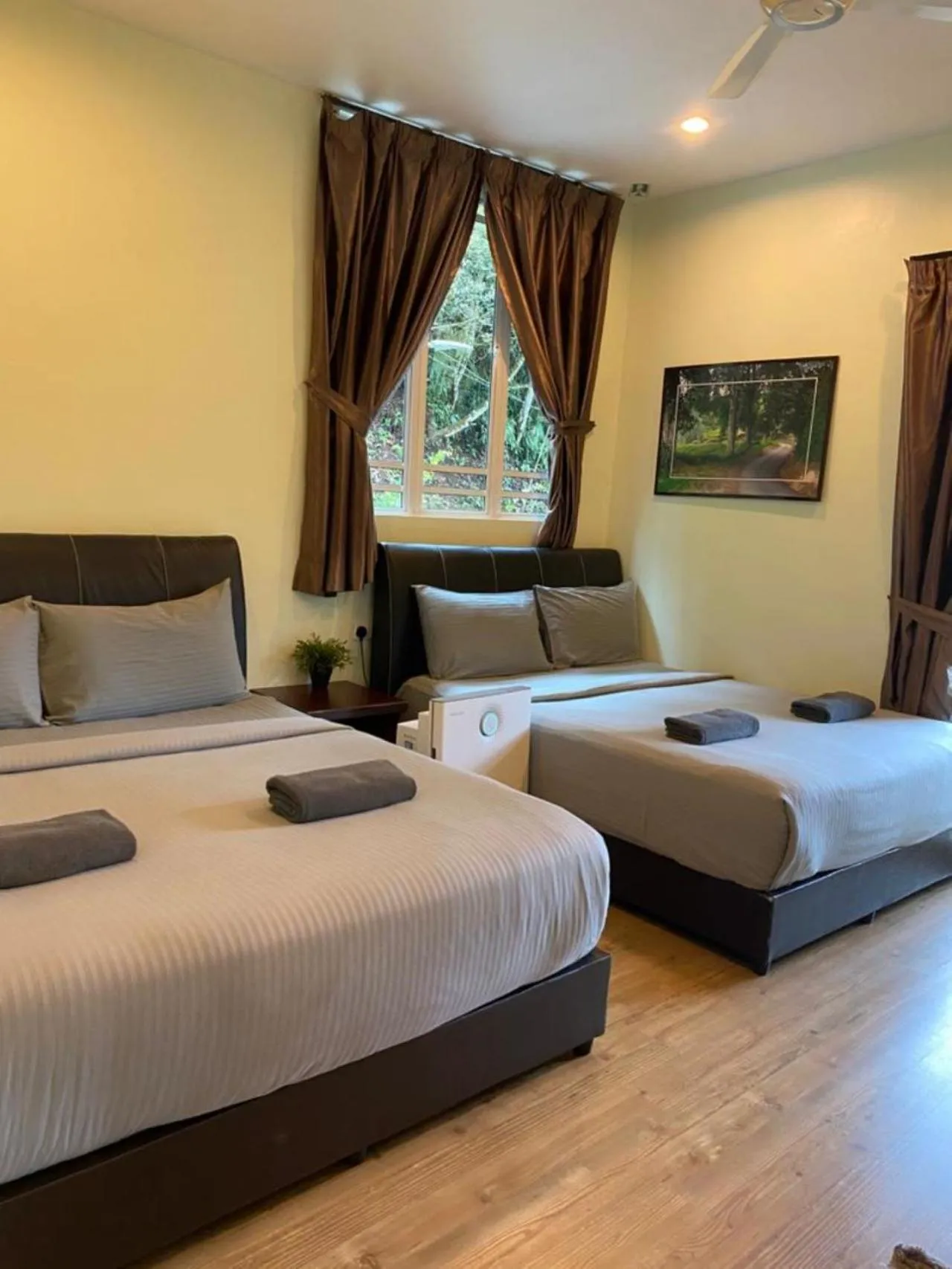 Bed in Highlanders Garden Guesthouse at Arundina Cameron Highlands