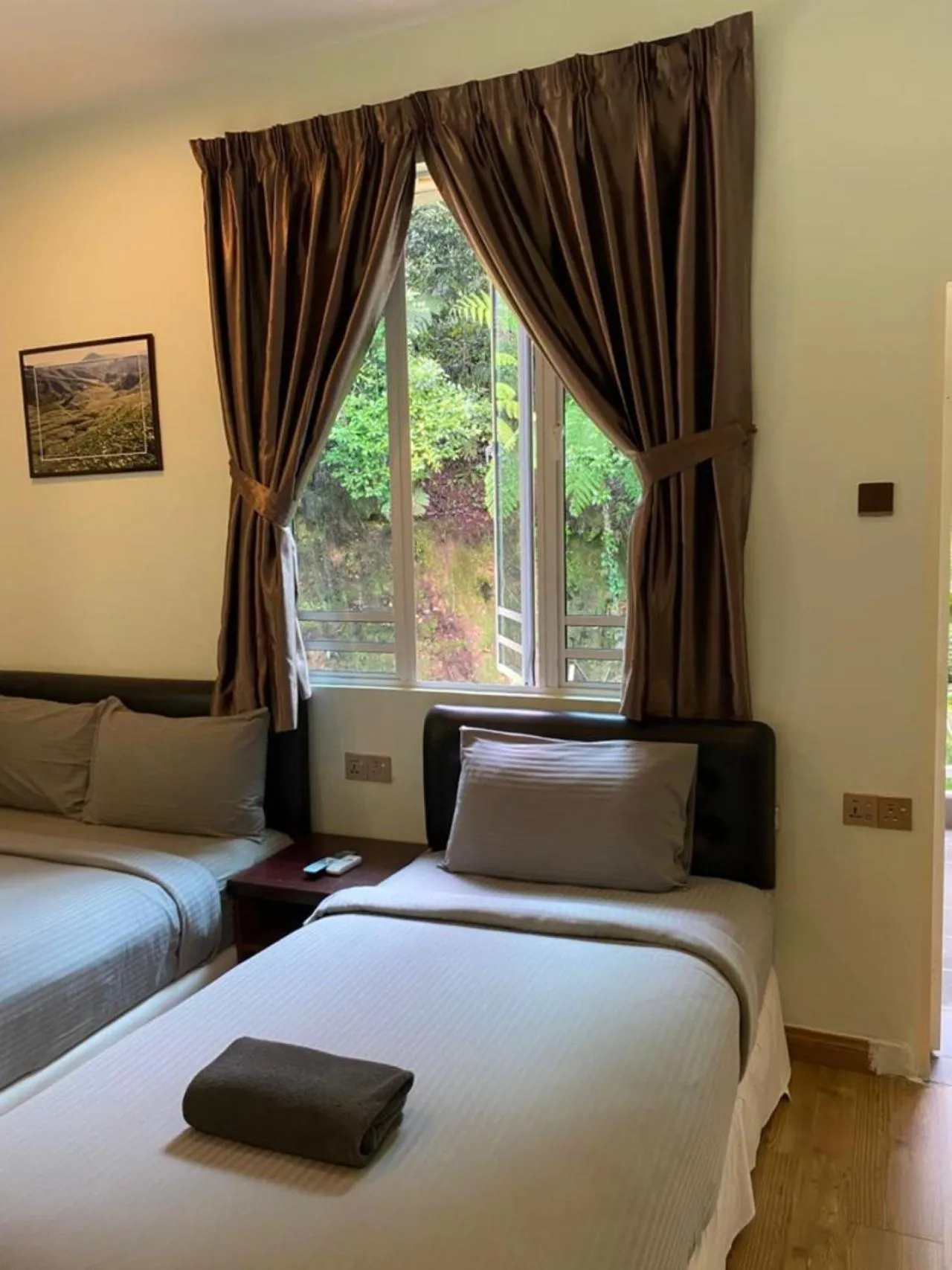 Bedroom, Bed in Highlanders Garden Guesthouse at Arundina Cameron Highlands