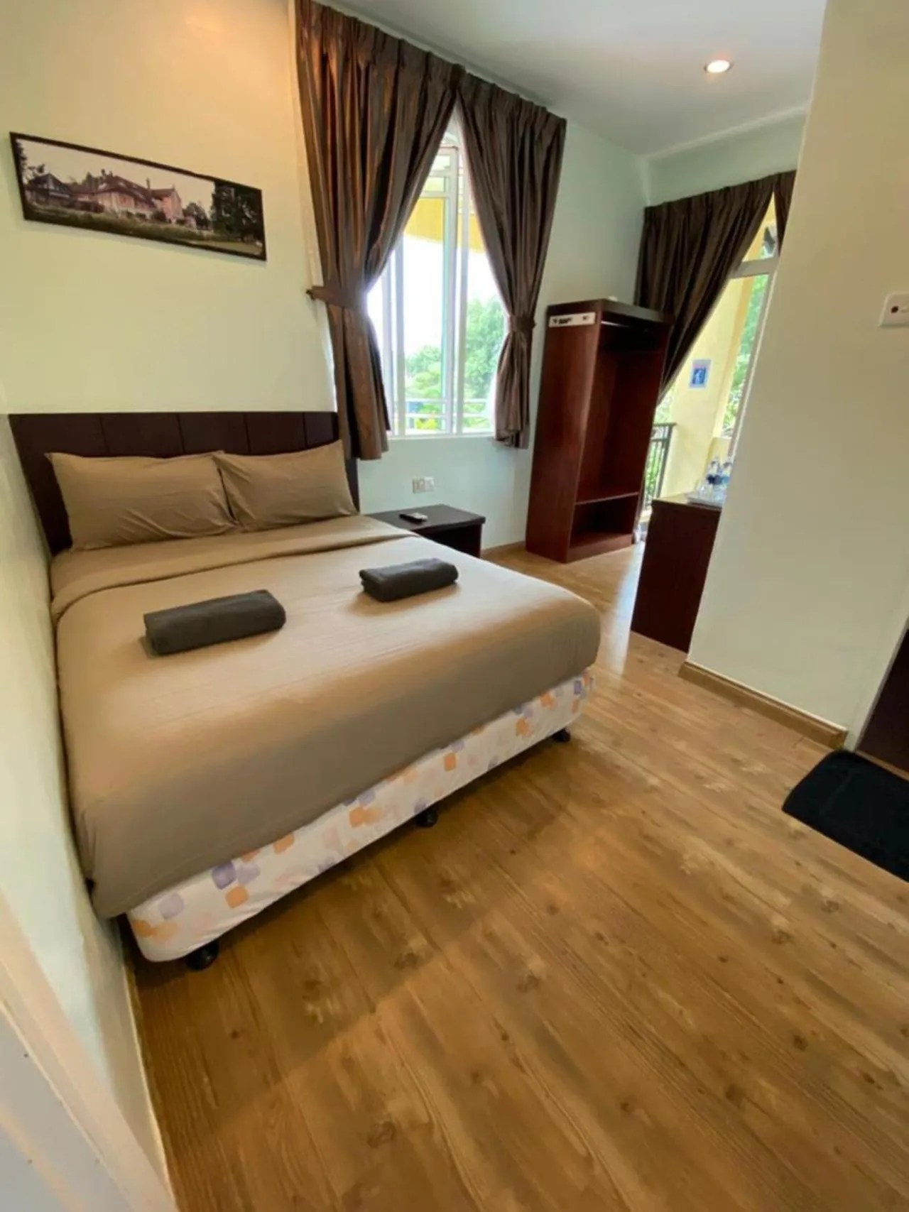 Bed in Highlanders Garden Guesthouse at Arundina Cameron Highlands