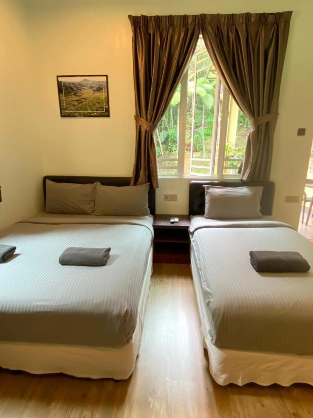 Bed in Highlanders Garden Guesthouse at Arundina Cameron Highlands