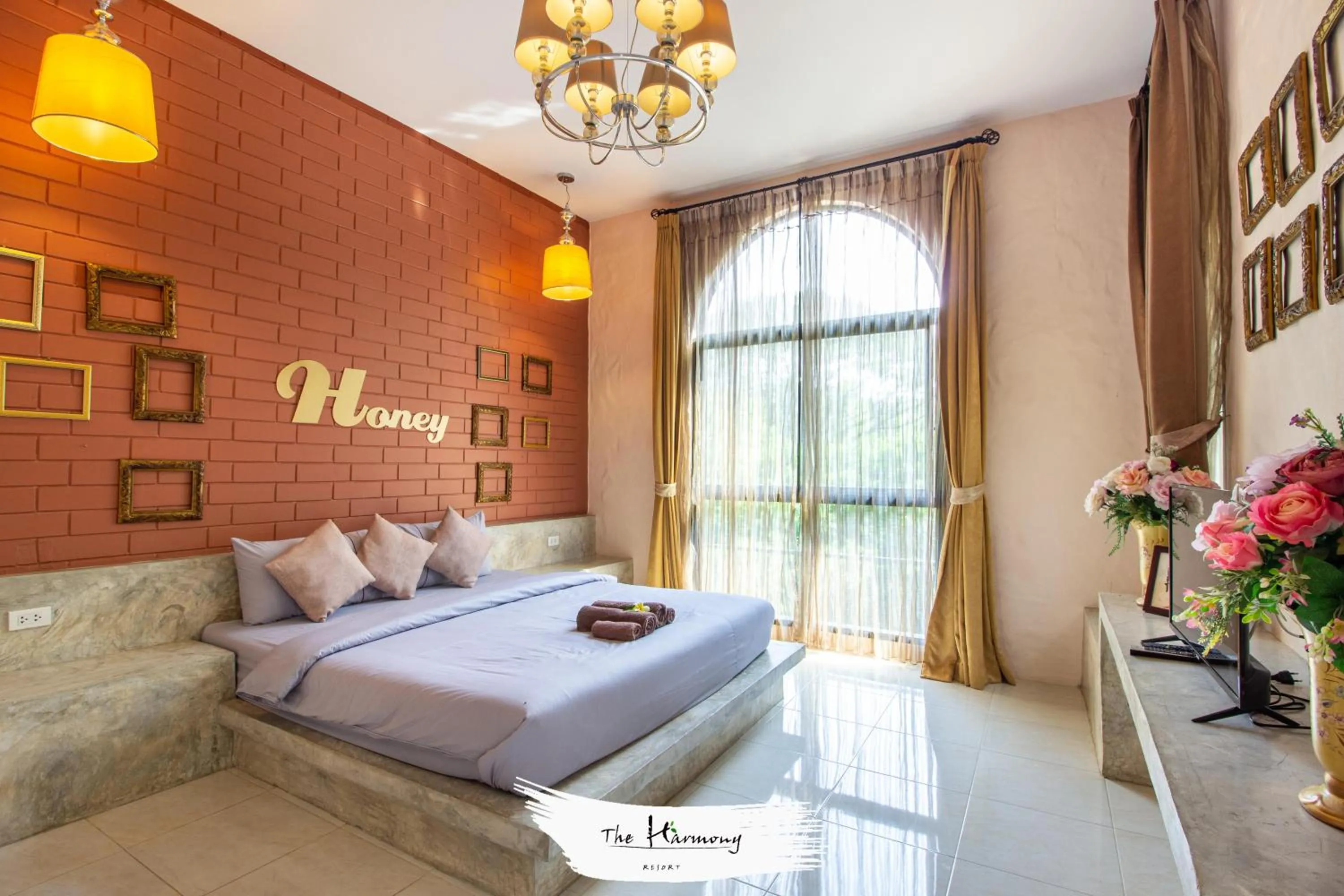 Bed in The Harmony Resort
