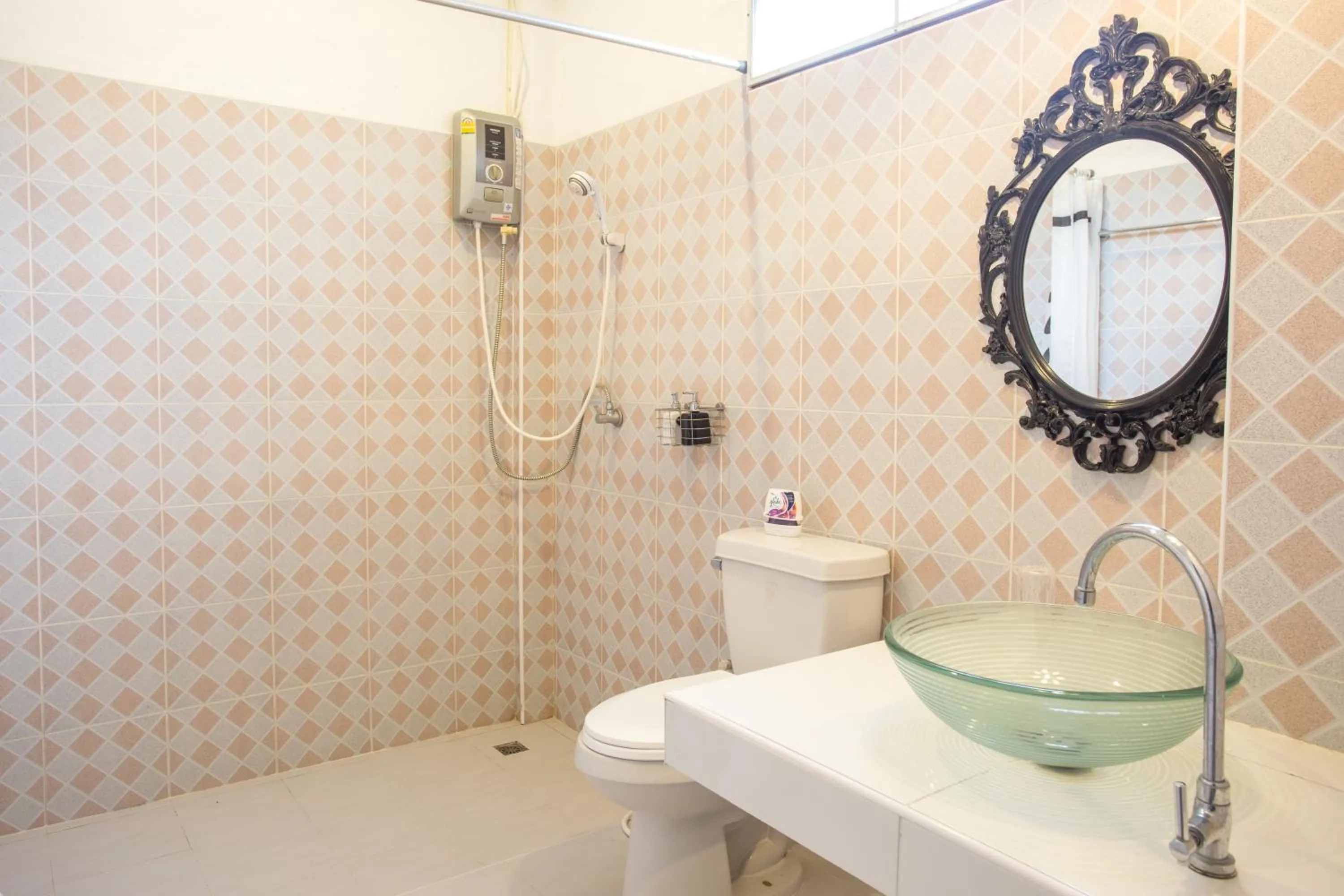 Shower in The Harmony Resort