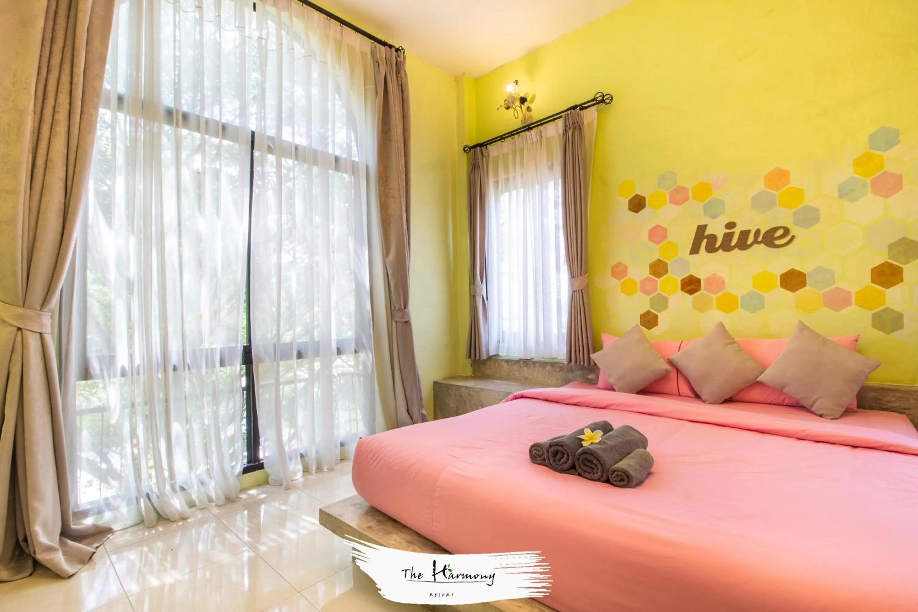 Bed in The Harmony Resort