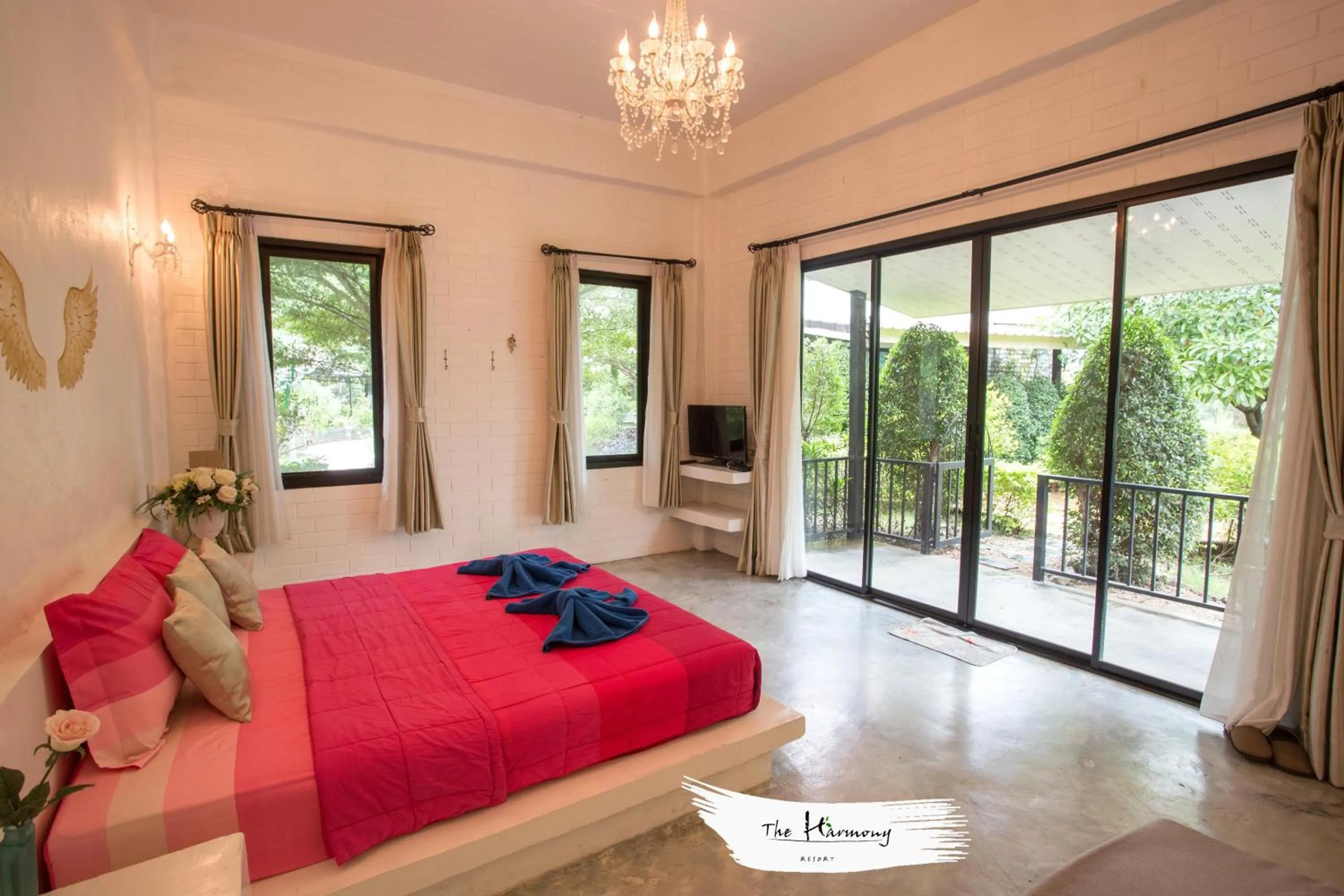 Bed in The Harmony Resort
