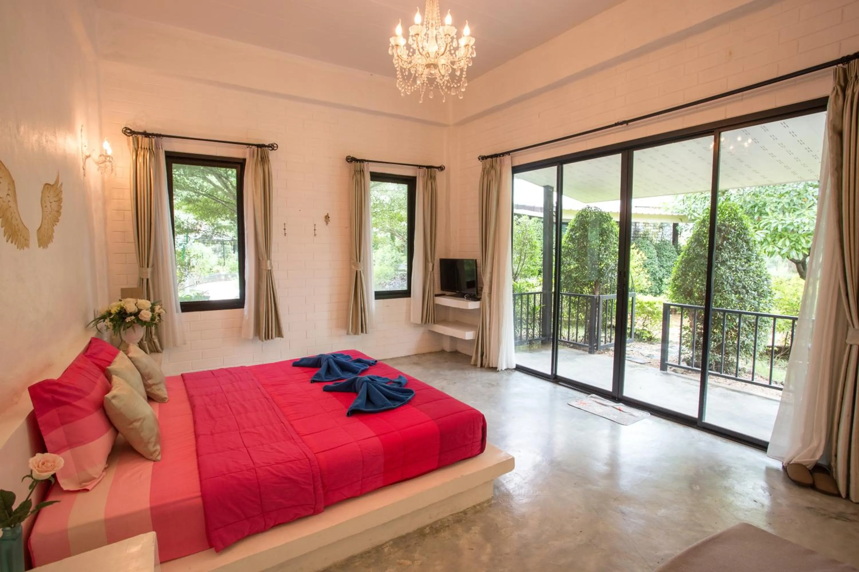 Bed in The Harmony Resort