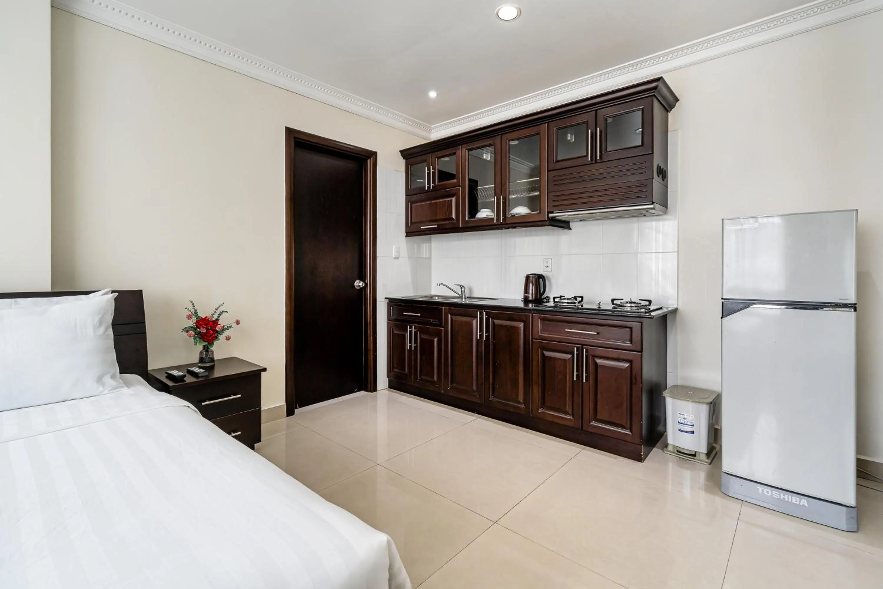 kitchen, Bed in La Bonita Hotel and Apartments