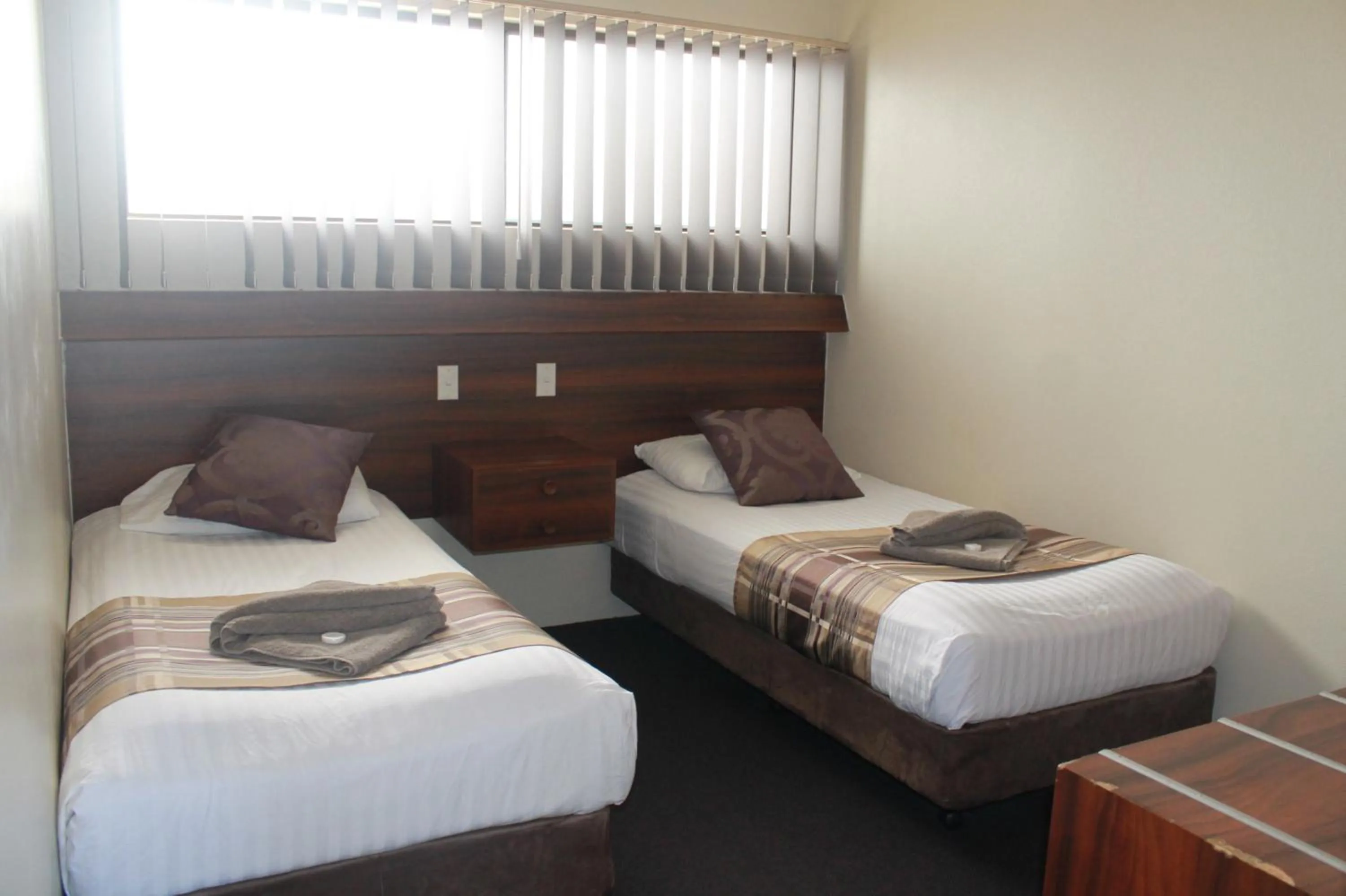 Bed in Sarina Motor Inn