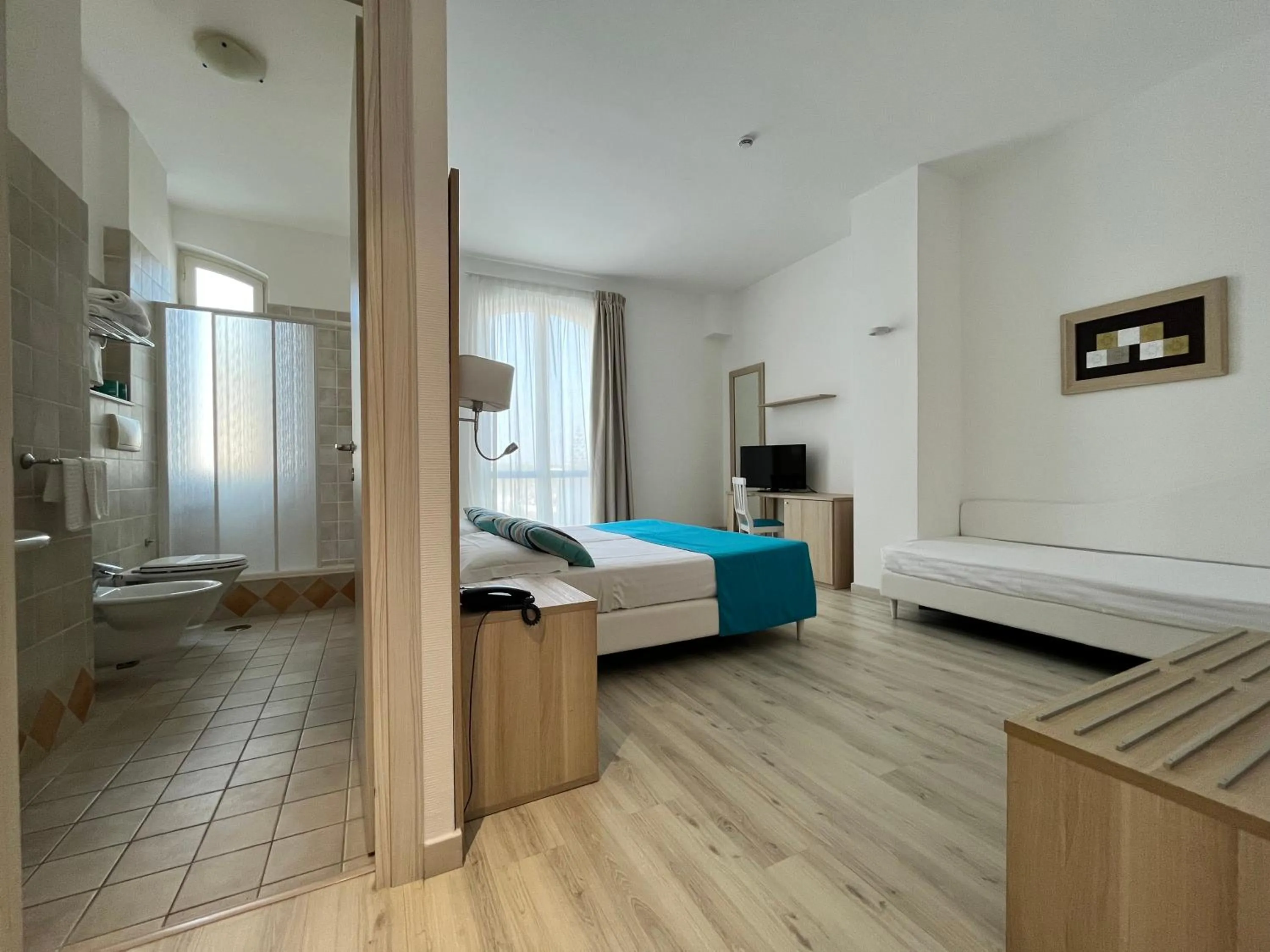 Photo of the whole room, Bed in Nicolaus Prime Il Gabbiano Hotel