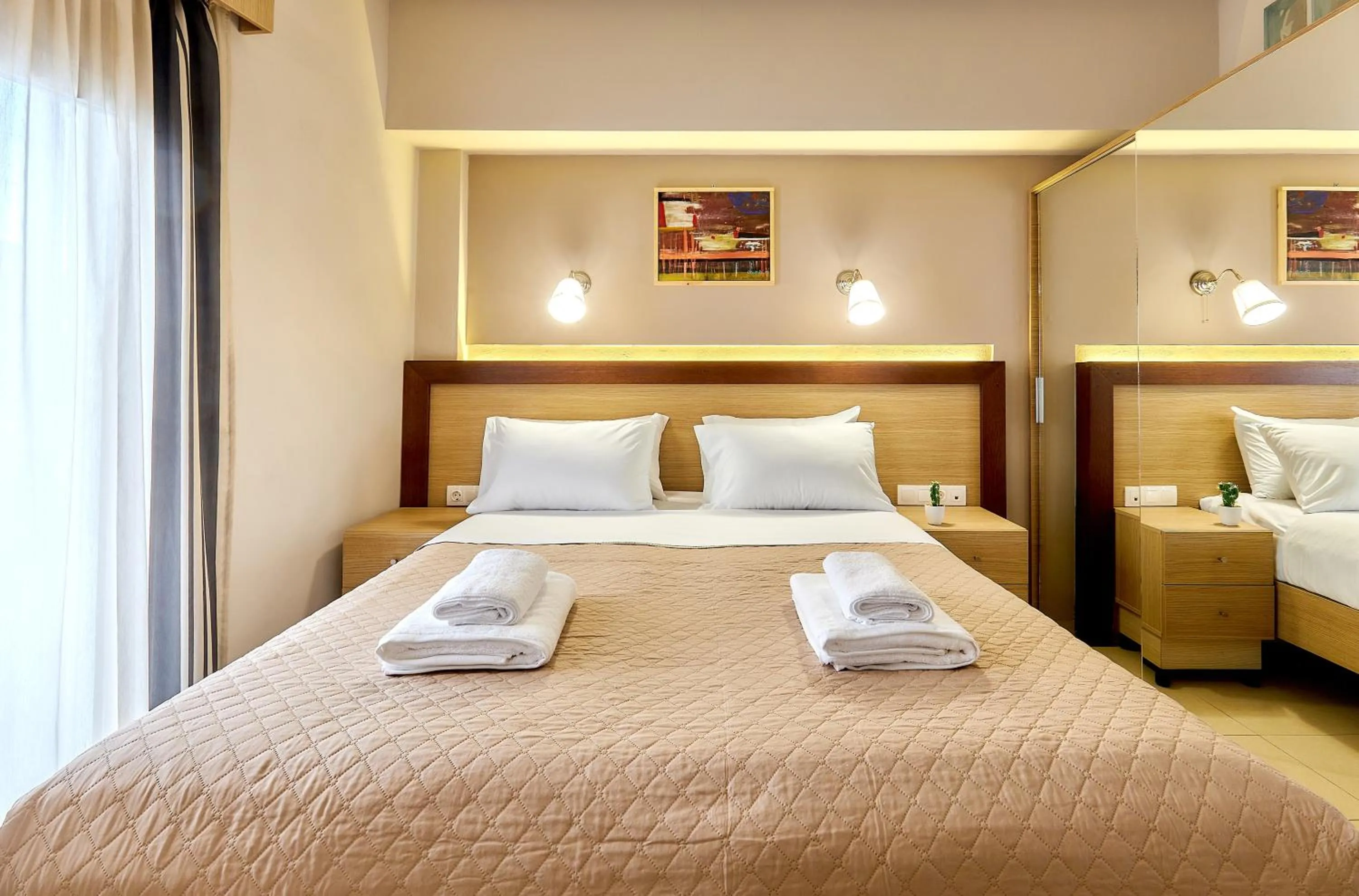 Bed in Dorian Boutique Hotel-Apartments