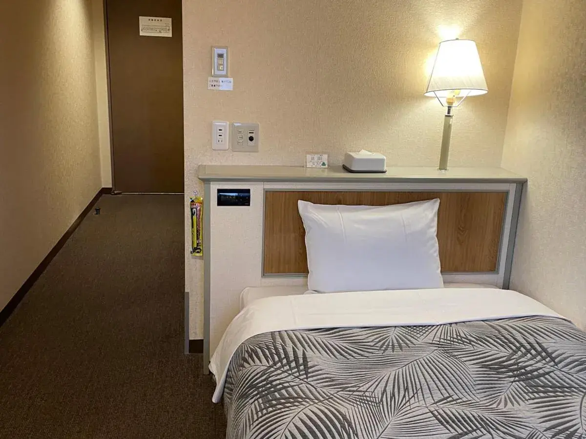 Bed in Hotel Machida Villa Bed in Hotel Machida Villa