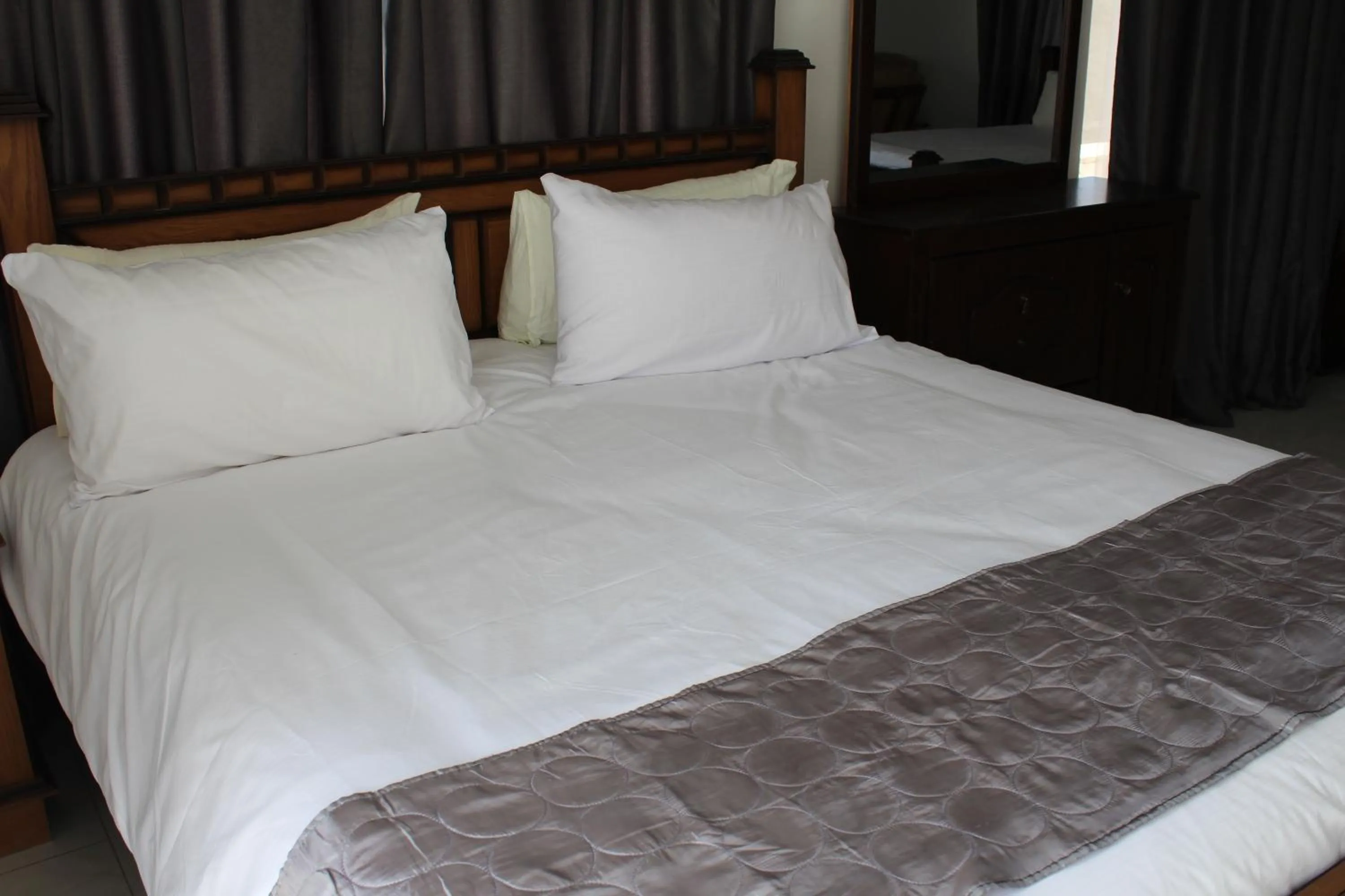 Bed in The Place Apartments