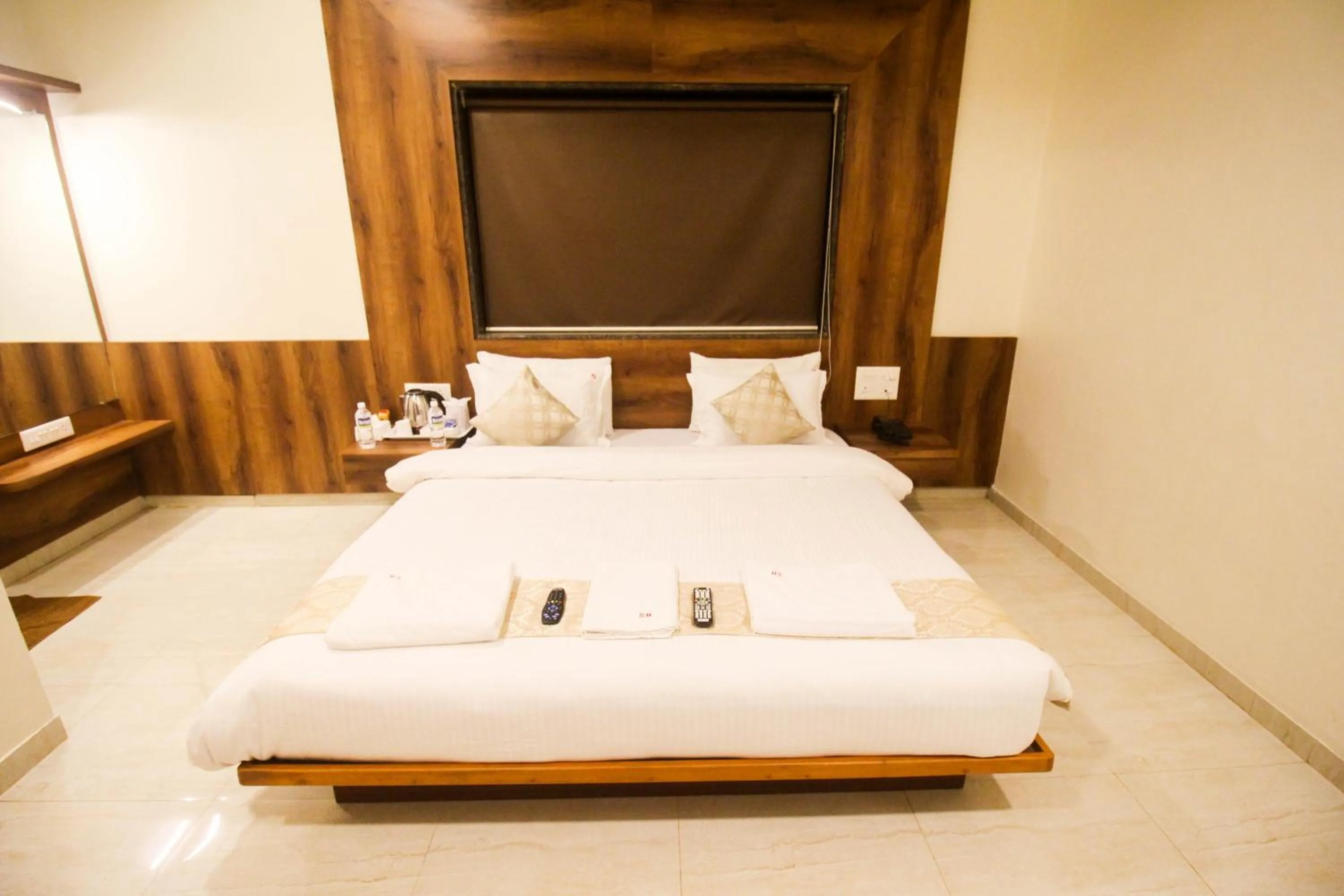 Bed in SHARDUL HERITAGE THE RESORT