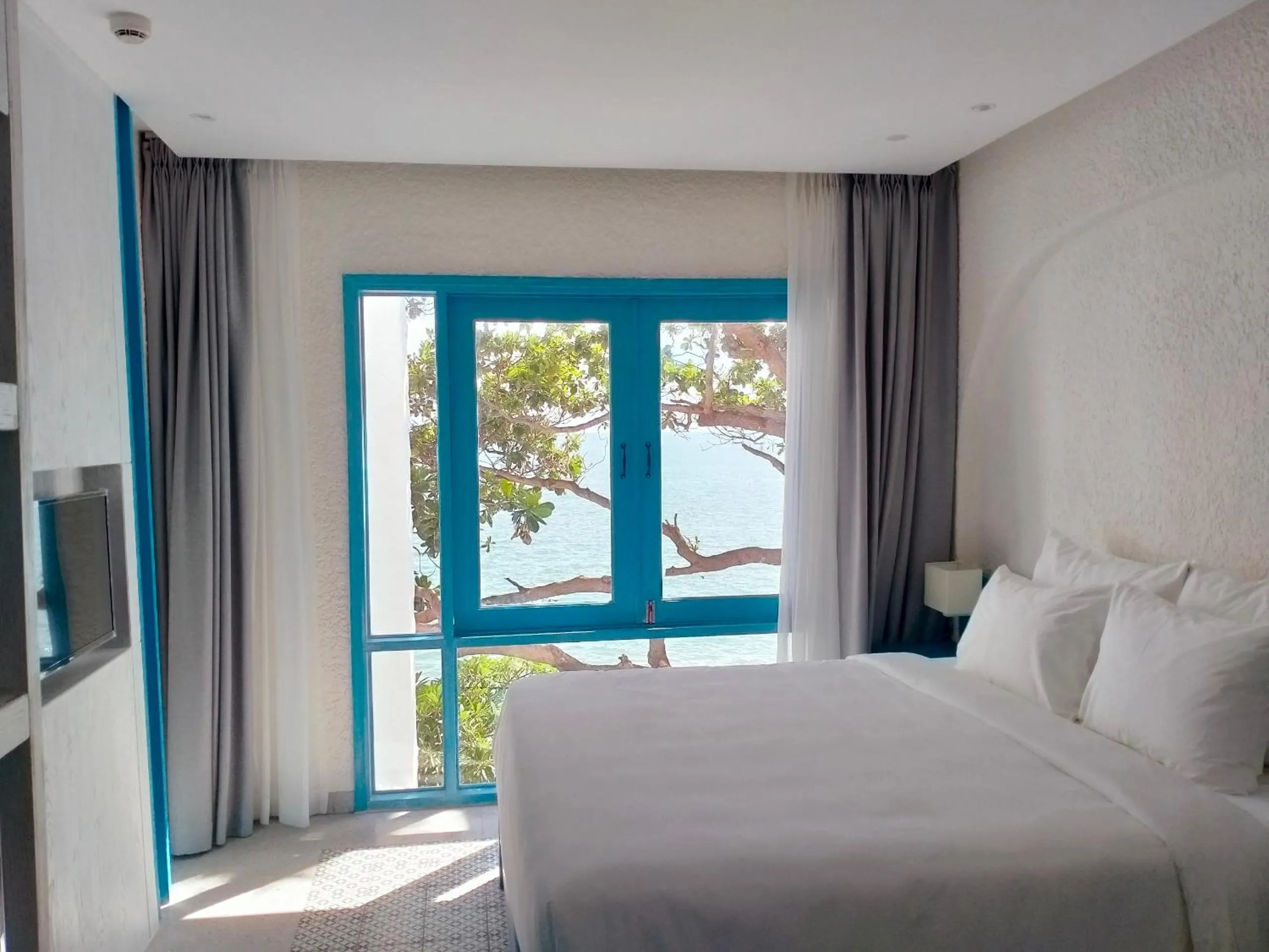 Bed in SUNTORINI BOUTIQUE HOTEL