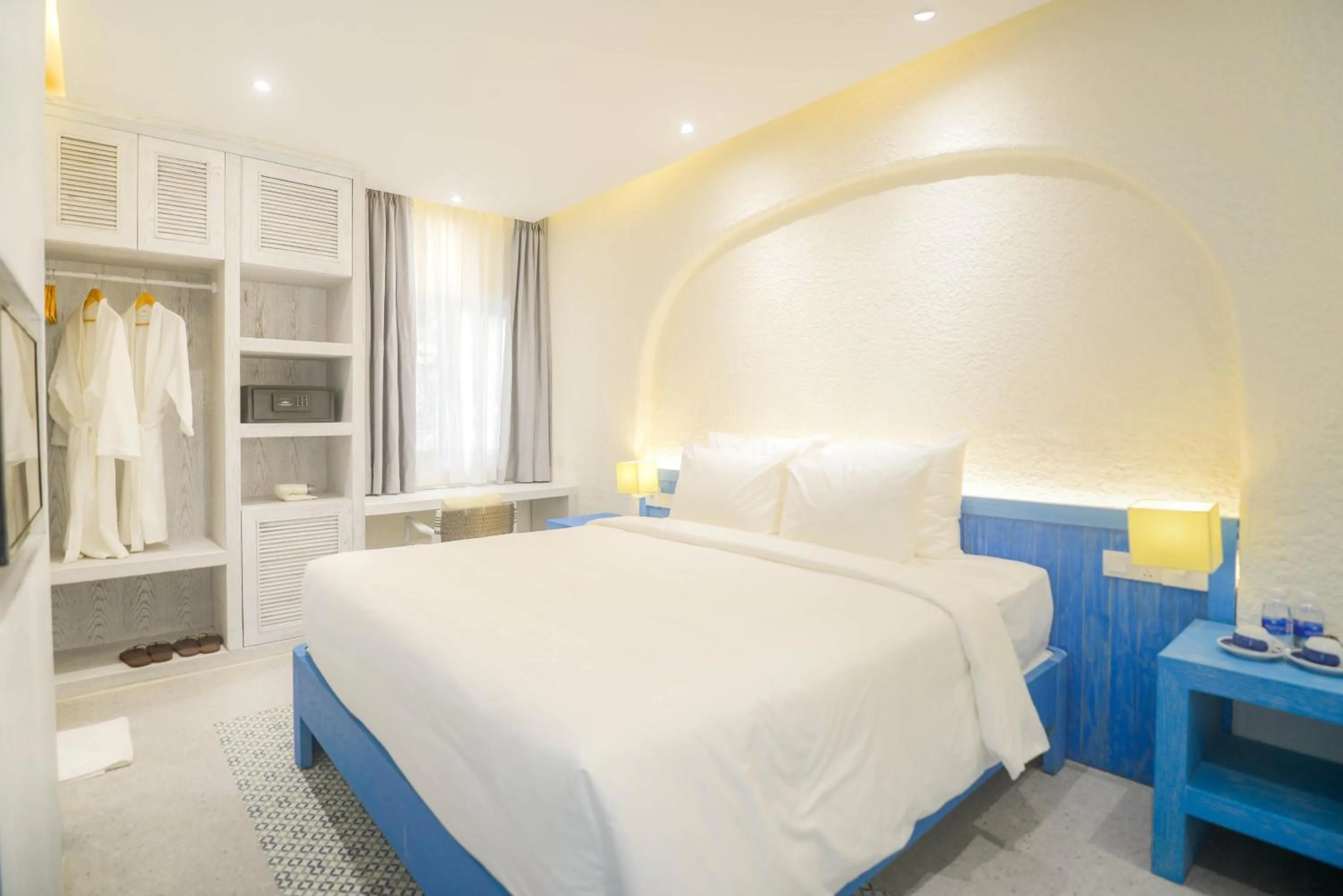 Bed in SUNTORINI BOUTIQUE HOTEL