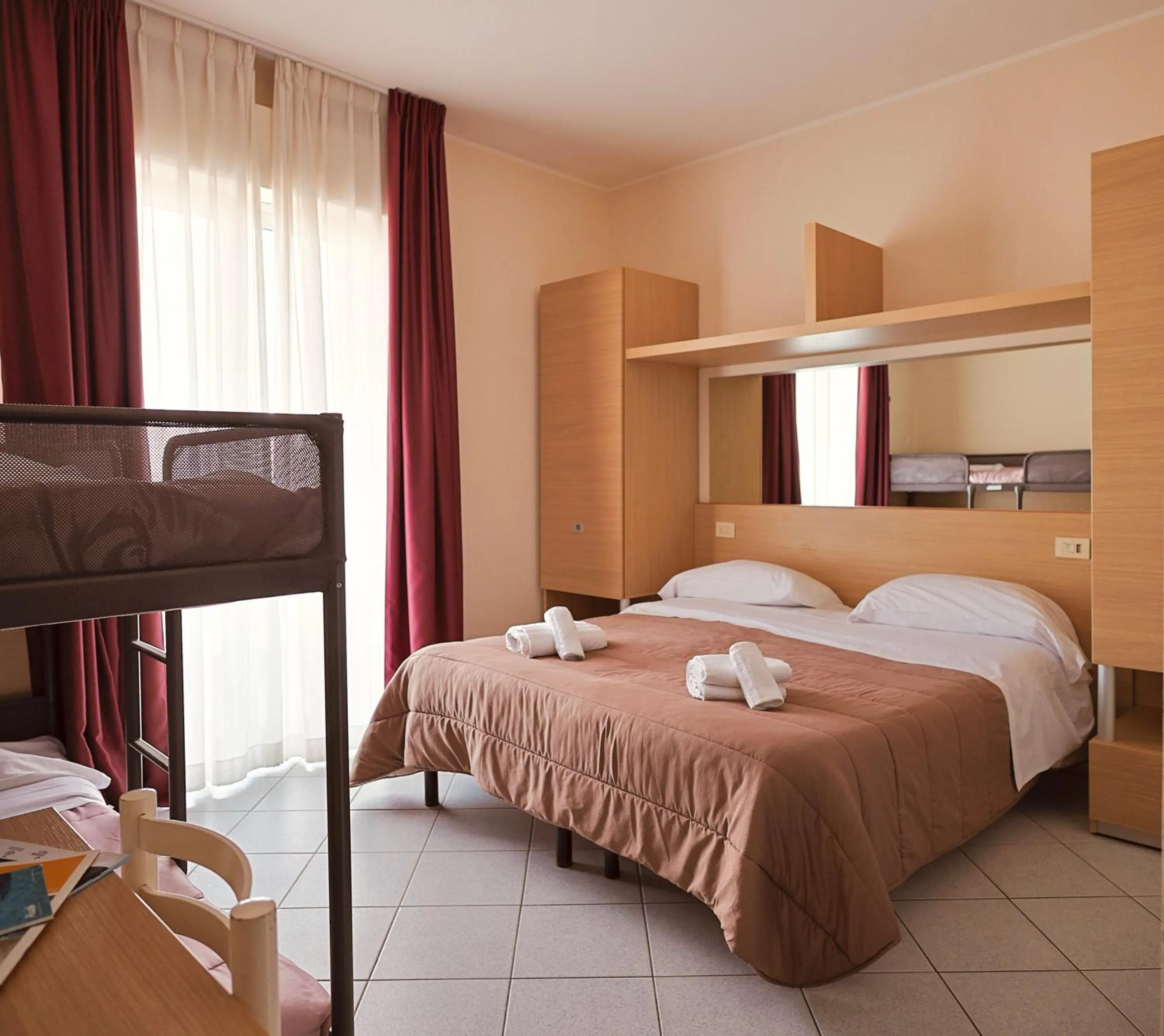 Bed in Hotel Felicioni