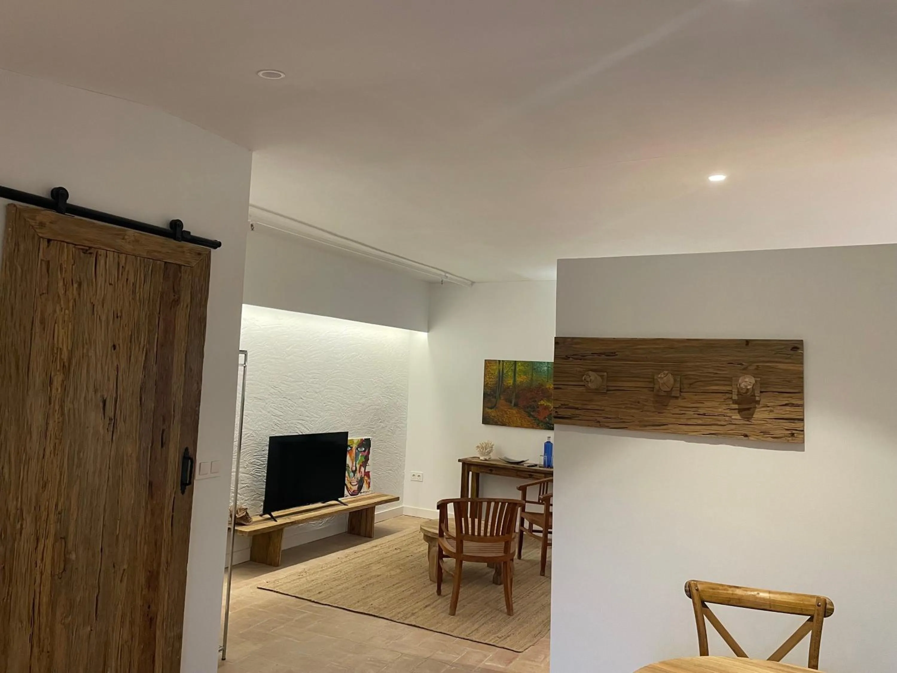 Communal lounge/ TV room in La Mer Hotel