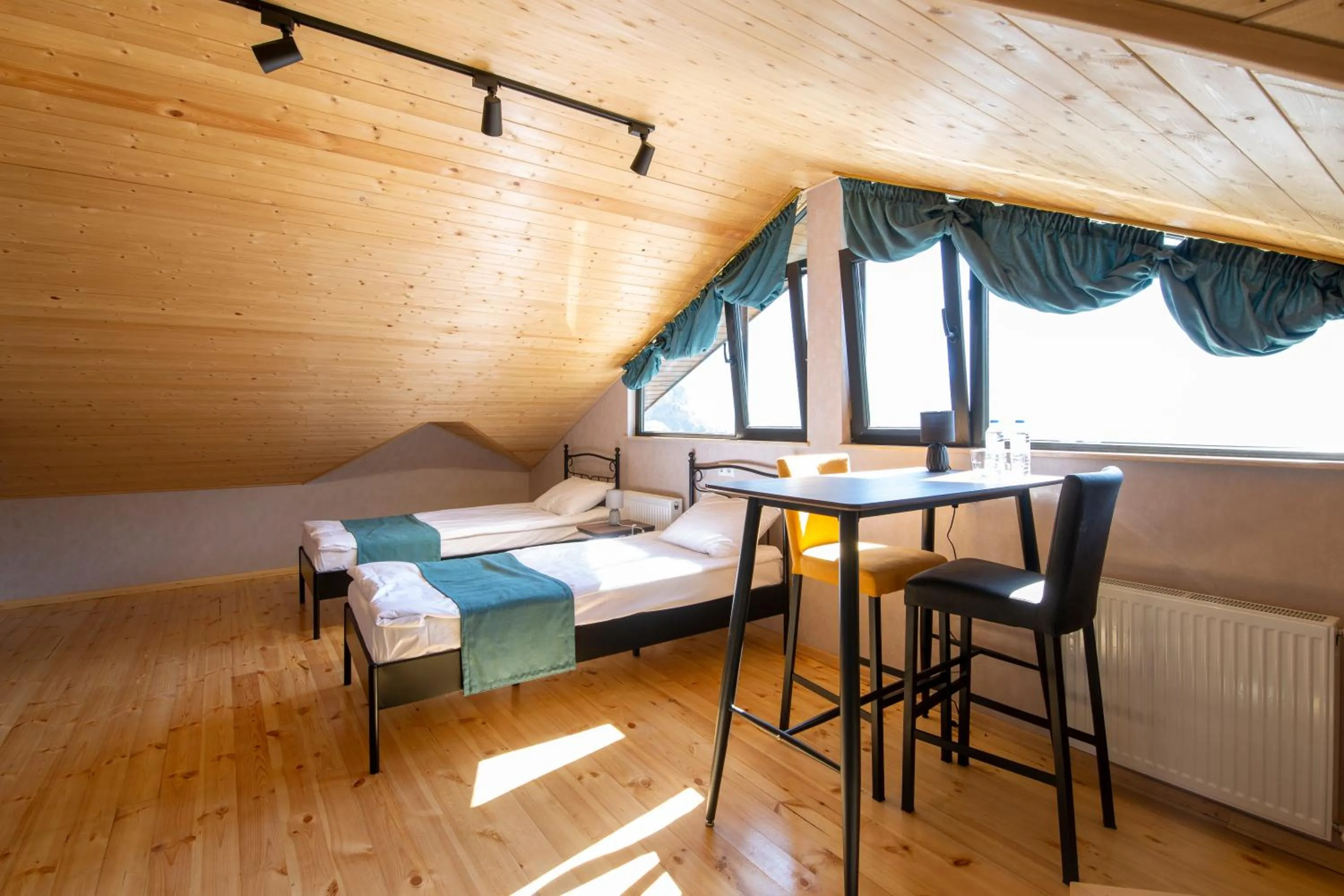 Photo of the whole room in Hotel GENI Kazbegi