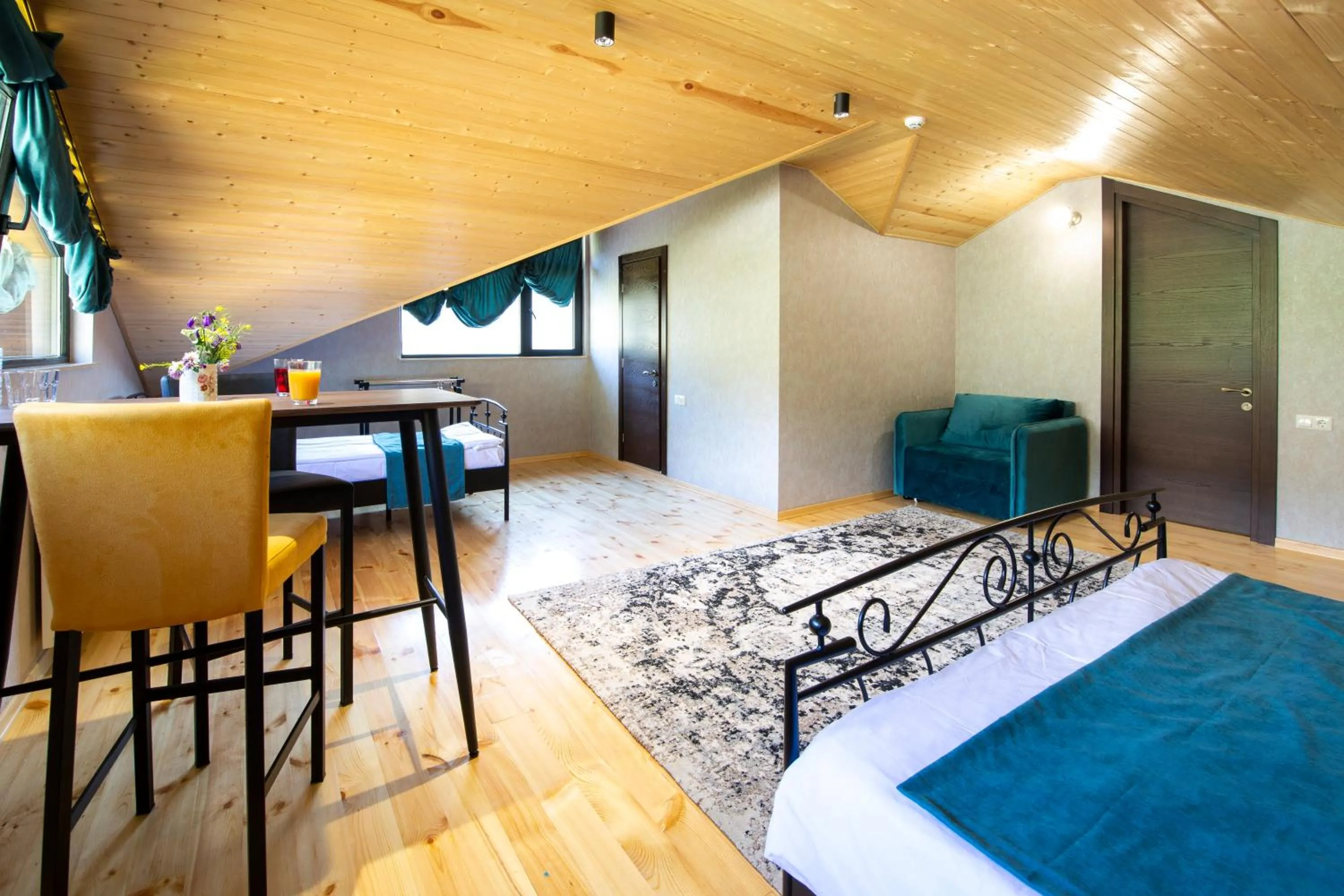 Bed in Hotel GENI Kazbegi