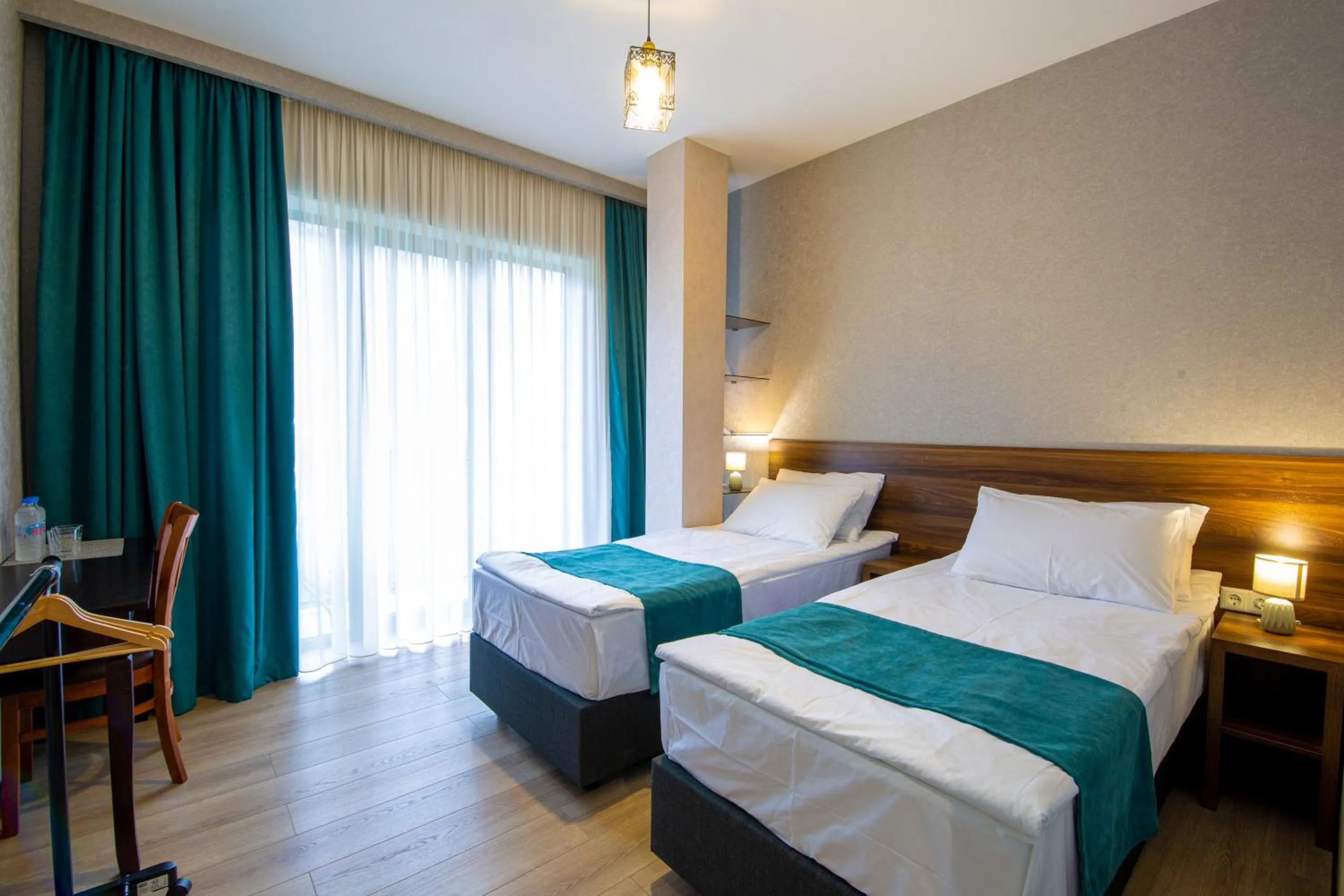 Bed in Hotel GENI Kazbegi