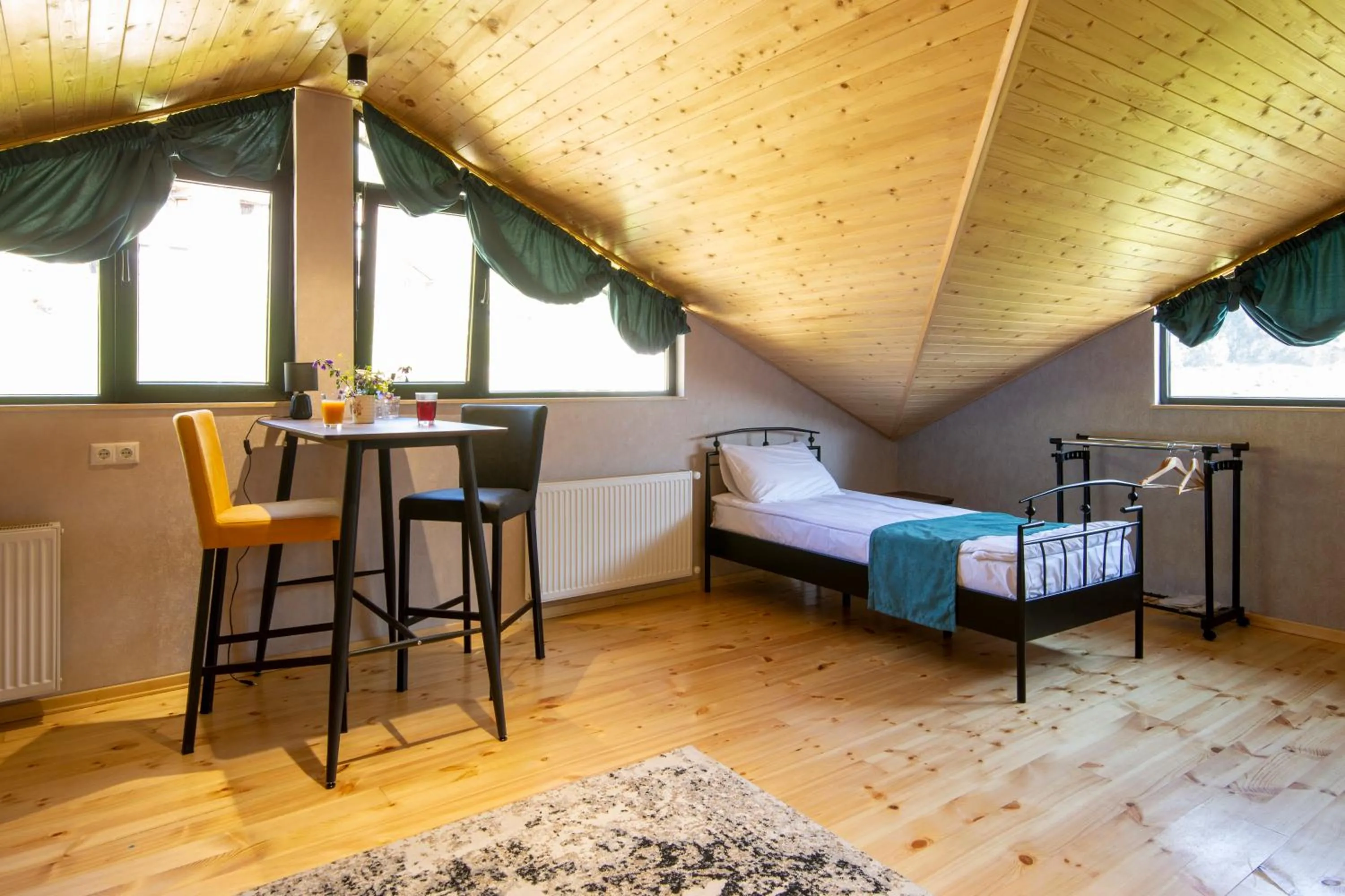Photo of the whole room, Bed in Hotel GENI Kazbegi