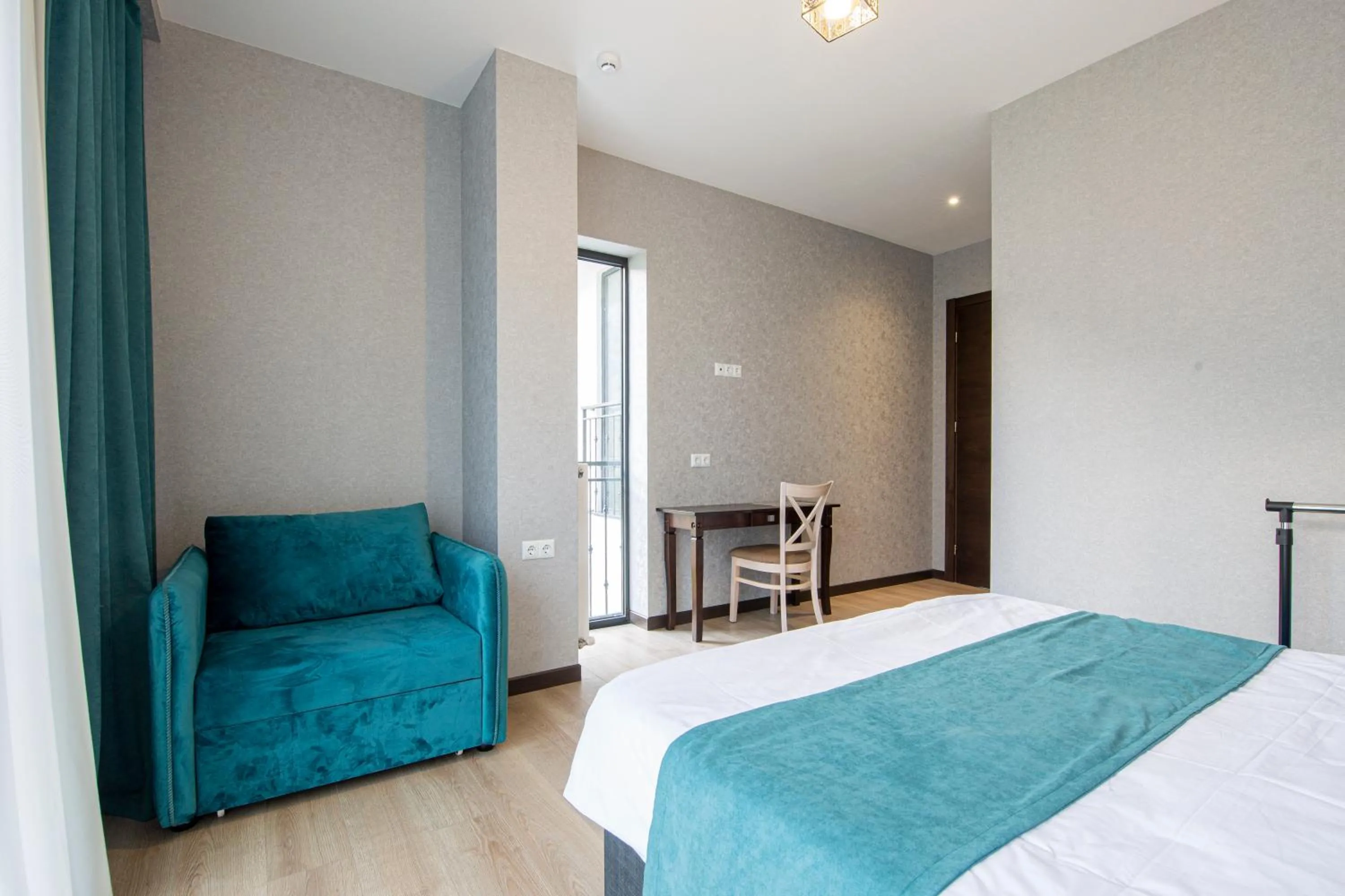 Bed in Hotel GENI Kazbegi