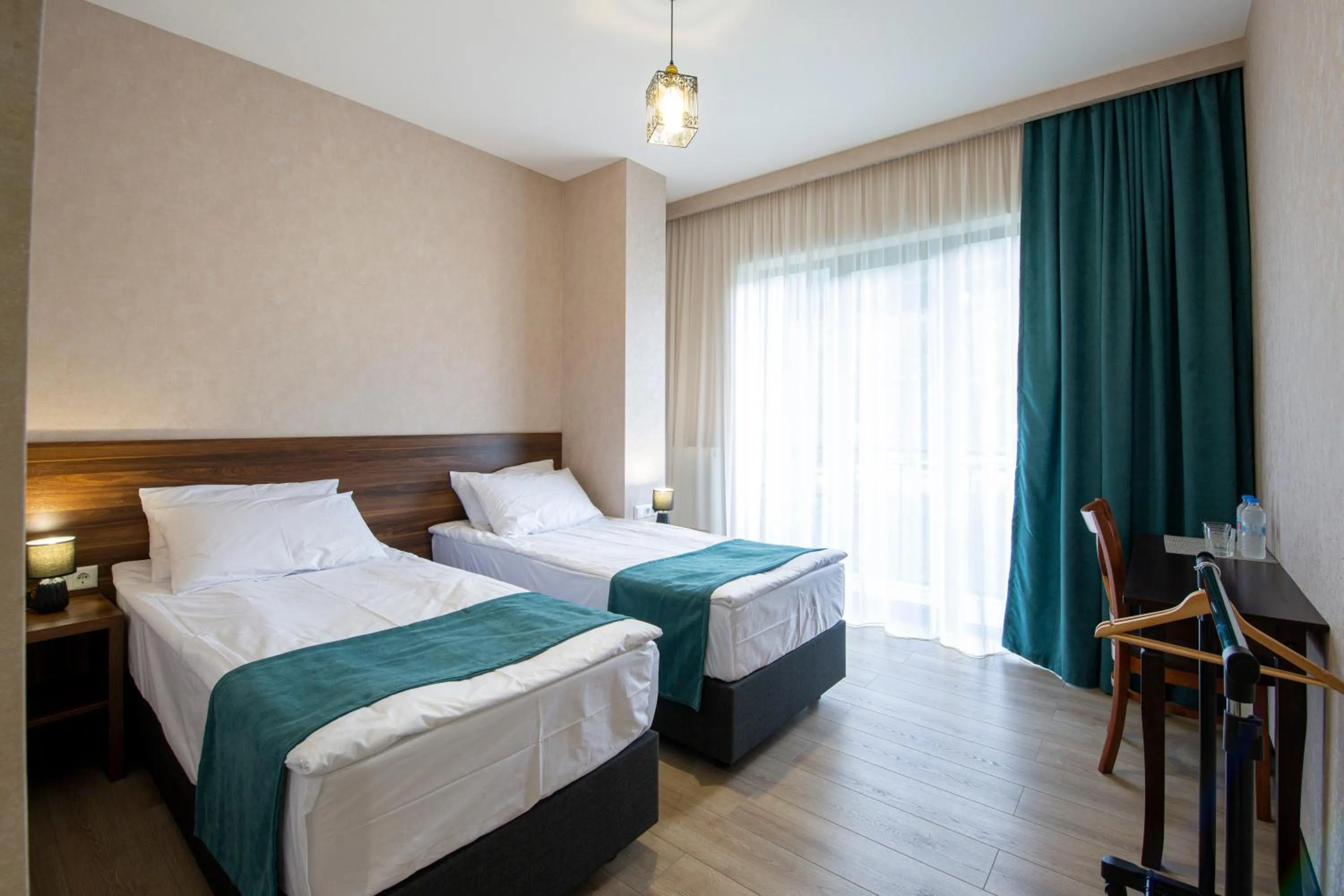 Bed in Hotel GENI Kazbegi