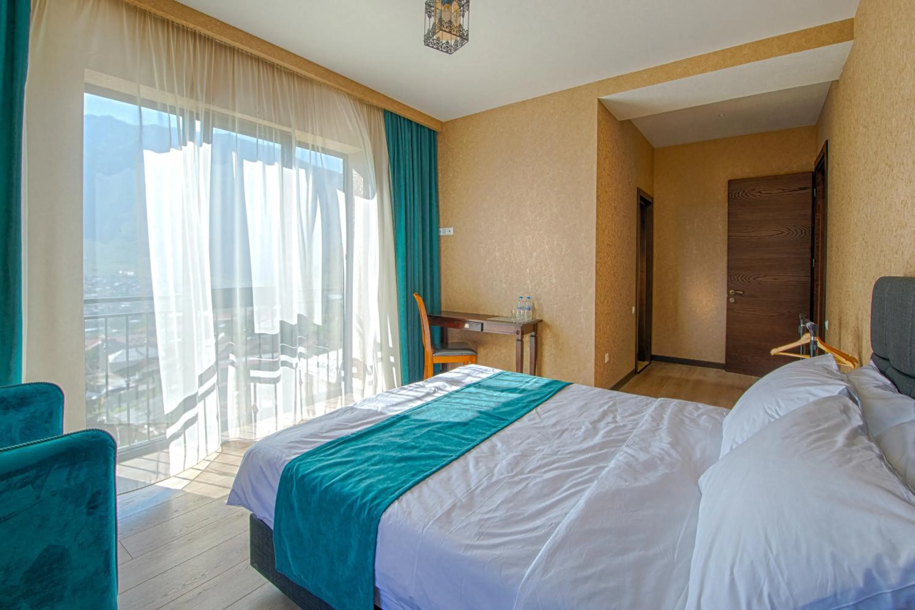 Bed in Hotel GENI Kazbegi