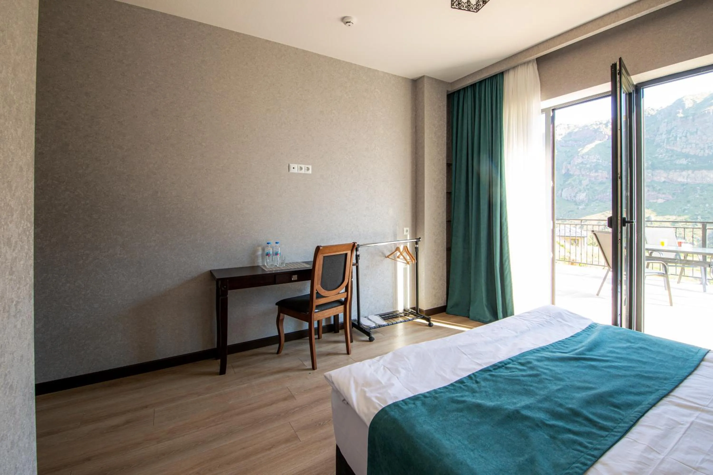 Bed in Hotel GENI Kazbegi