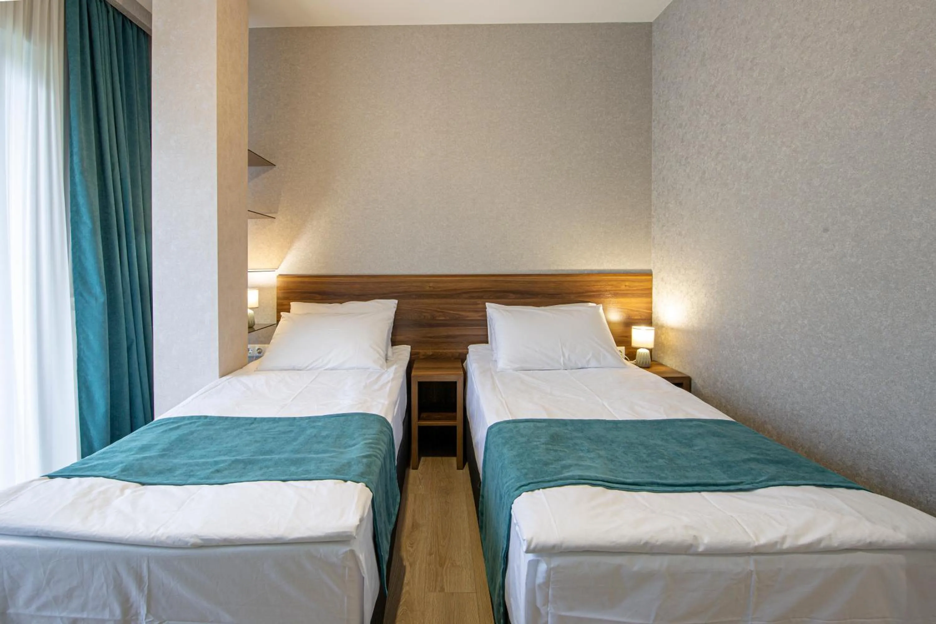Bed in Hotel GENI Kazbegi