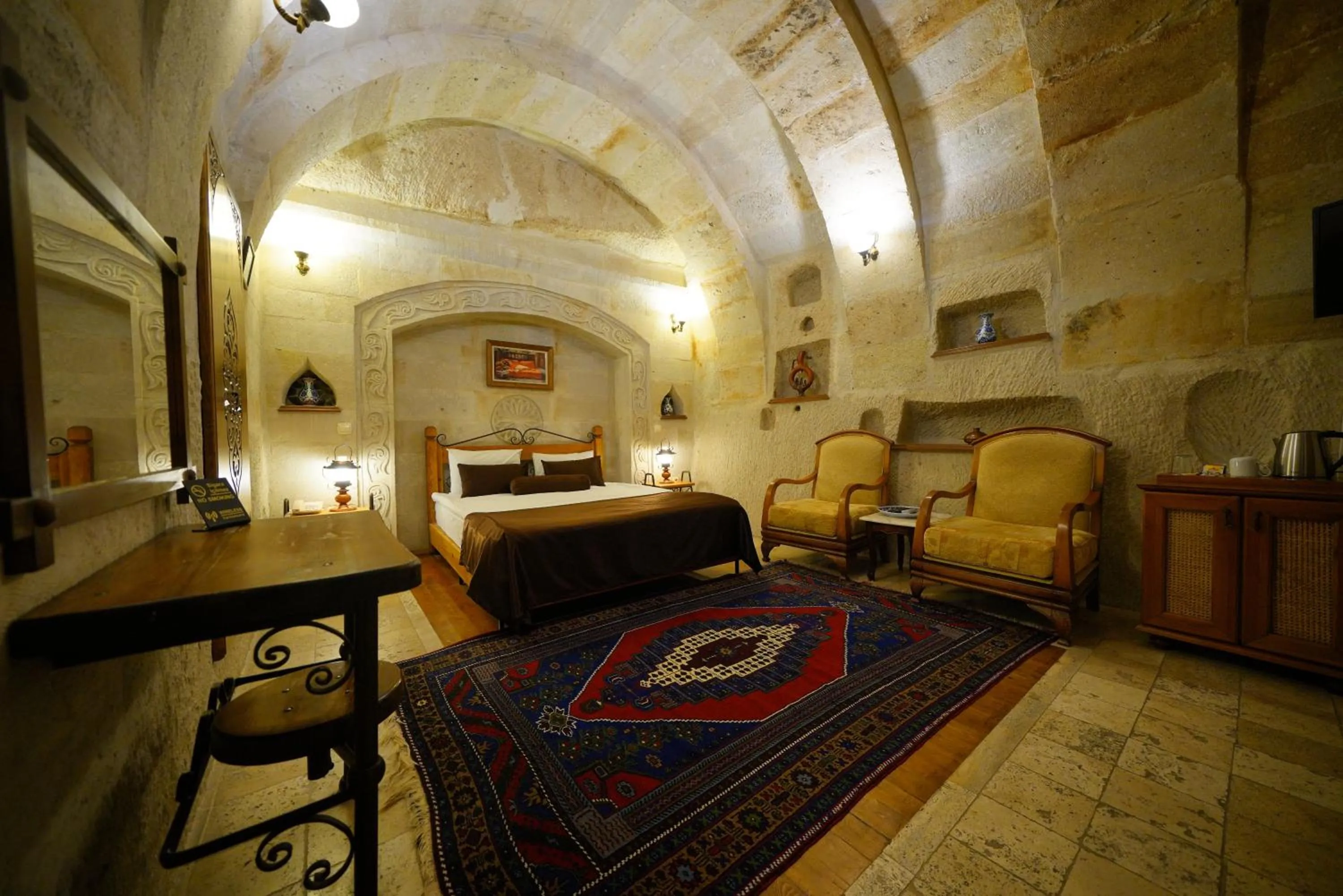 Bed in Harman Cave Hotel