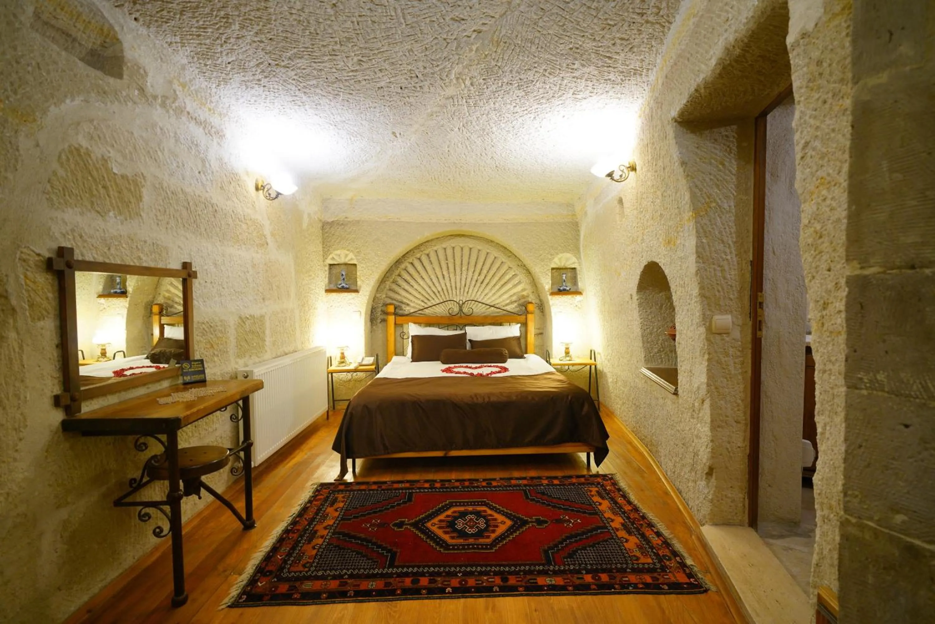 Bed in Harman Cave Hotel
