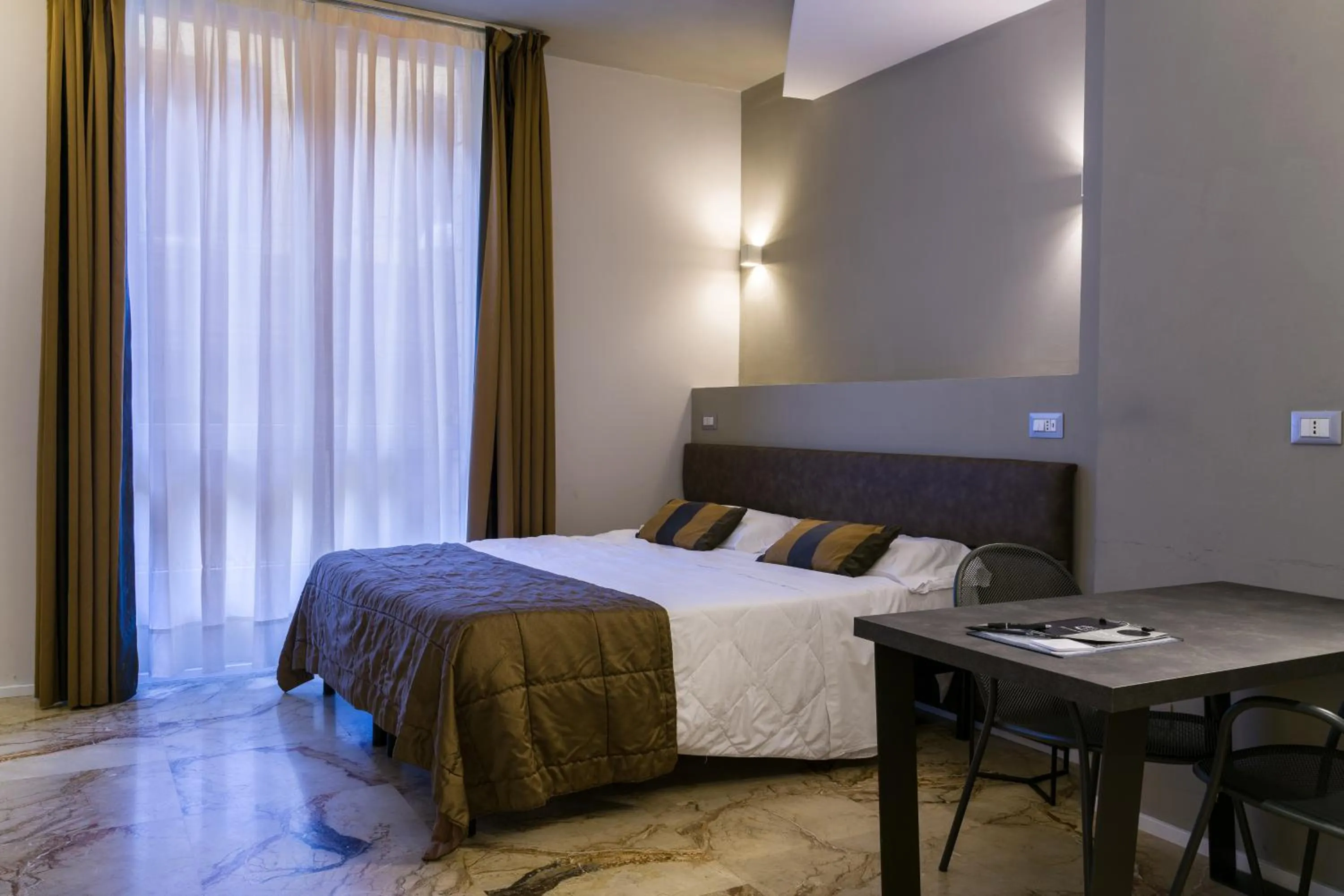 Bed in Appartamenti Astoria