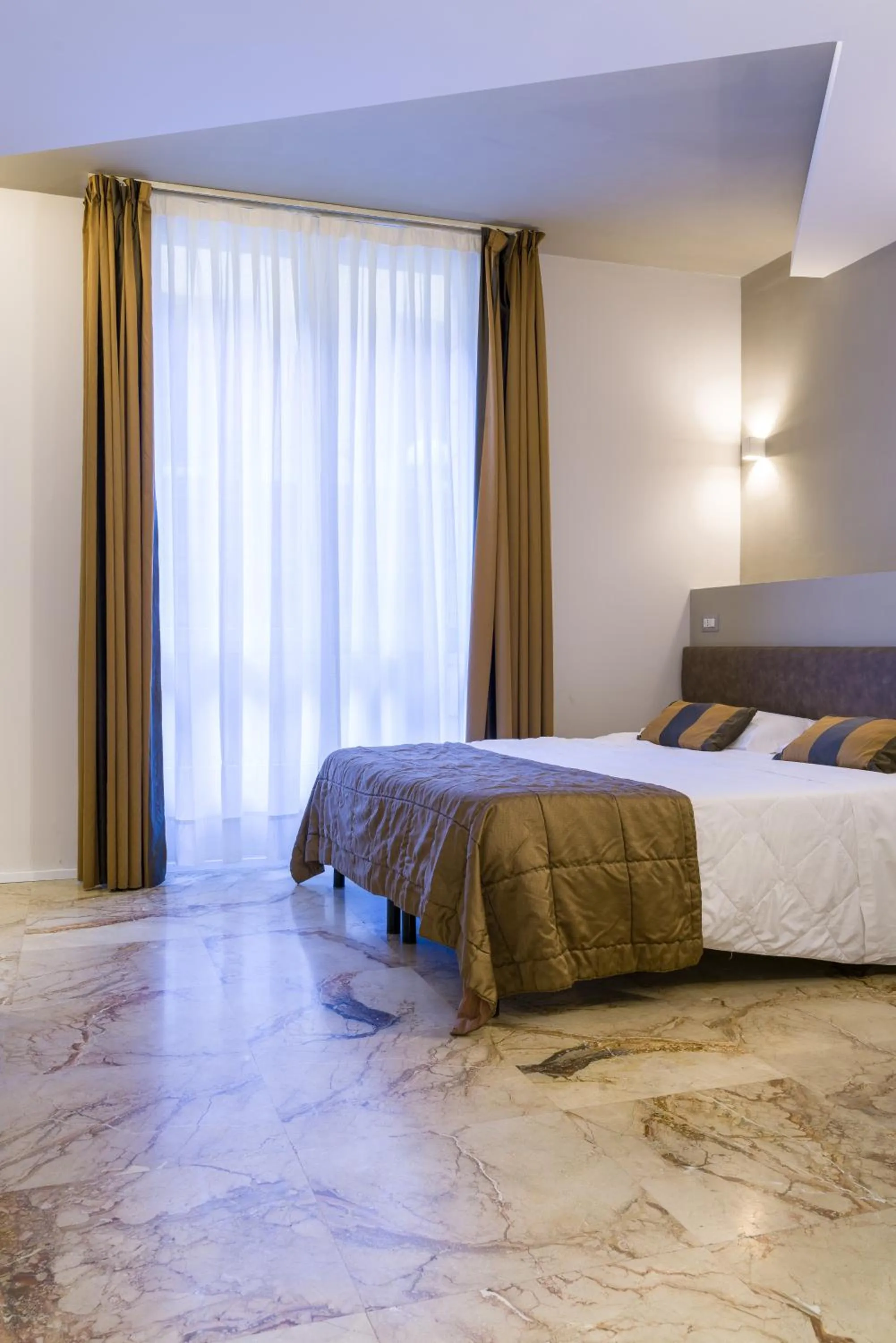 Bed in Appartamenti Astoria